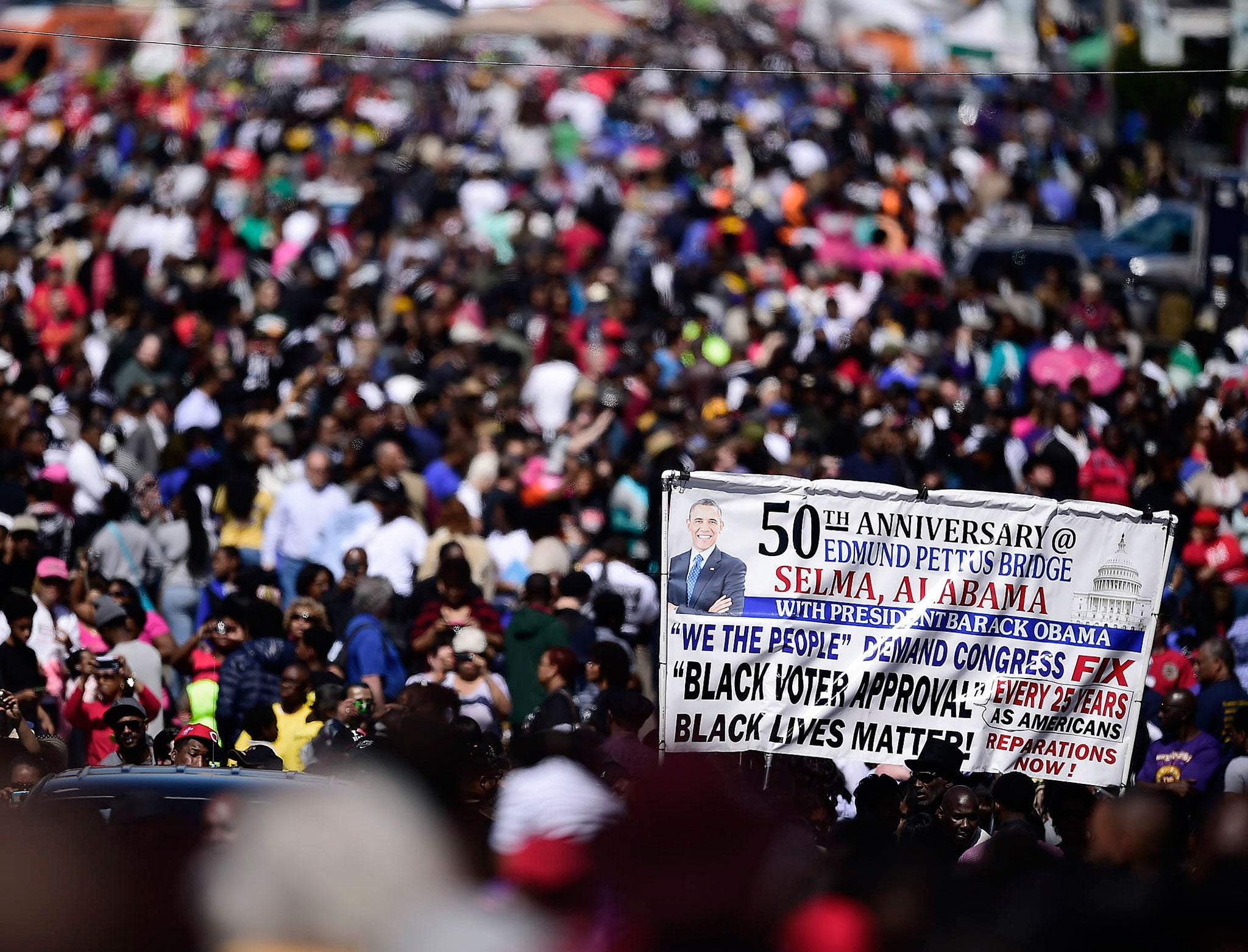 The predominately black crowds that gathered near the Edmund Pettus Bridge in Selma appeared to be as concerned with the present as much as the past