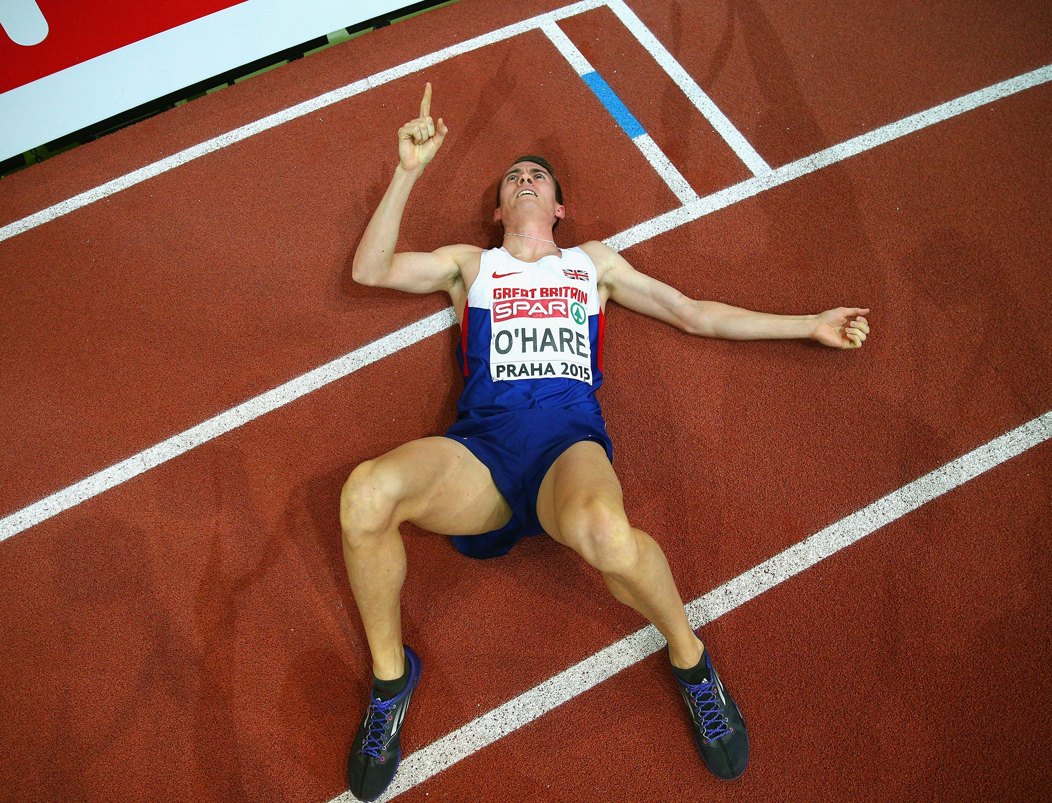 Chris O’Hare lies on the track after clinching 800m bronze