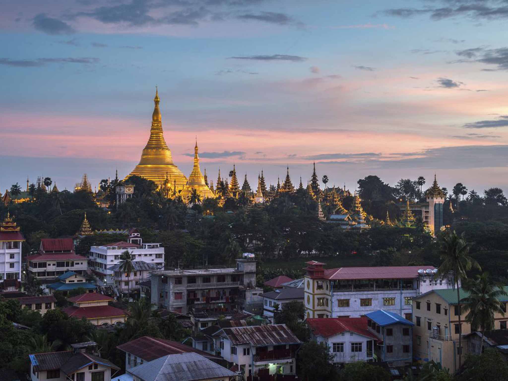 Shwedagon rises up through the trees