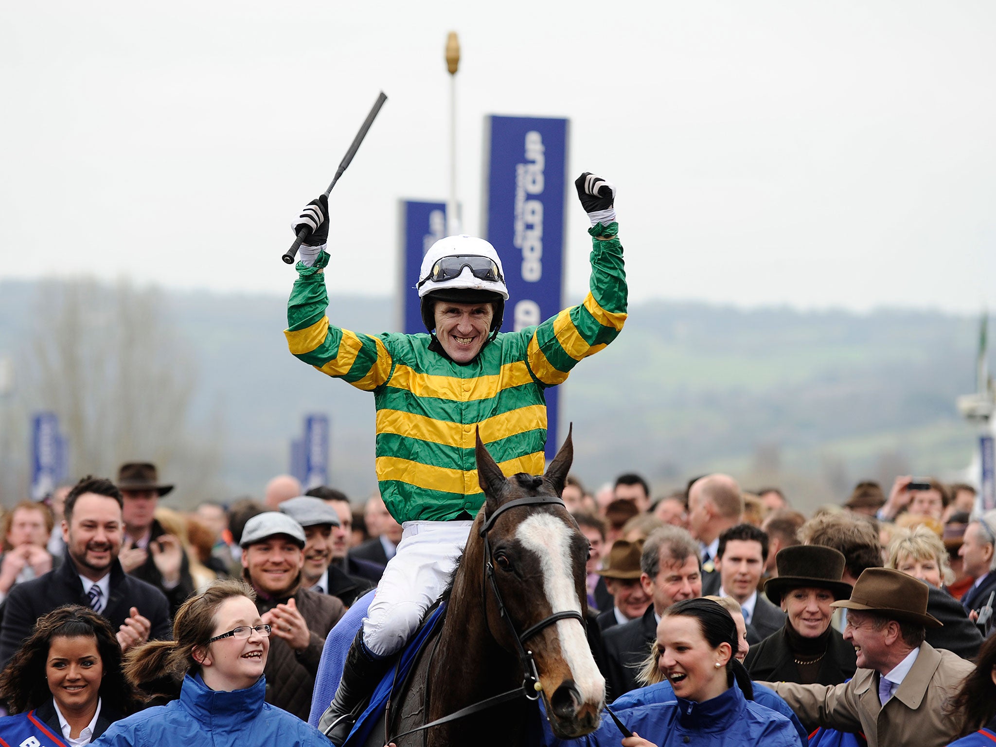 Tony McCoy triumphs in the 2012 Gold Cup with Synchronised