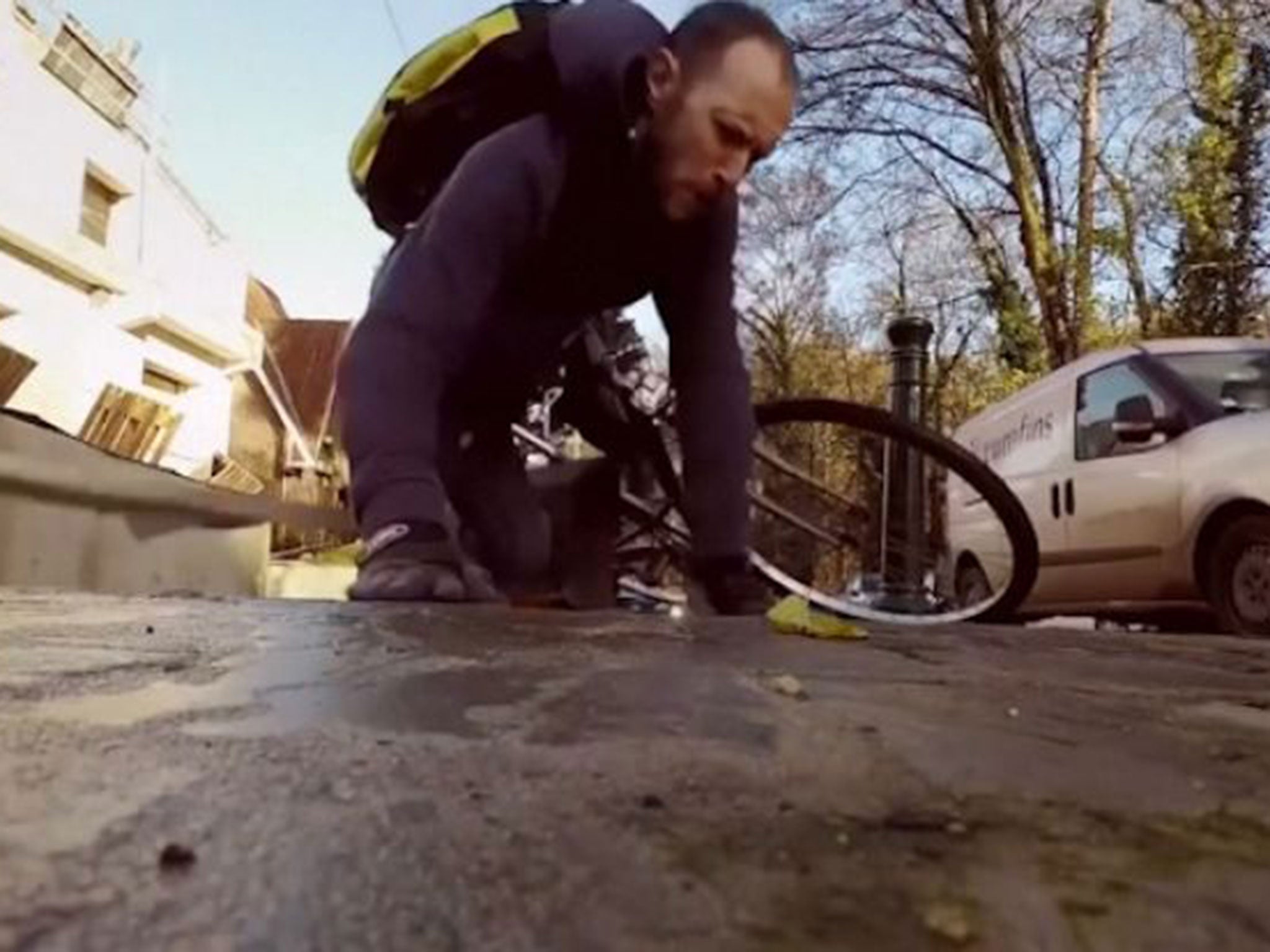 Brussels cyclist takes a hit on one of the city's cycle lanes