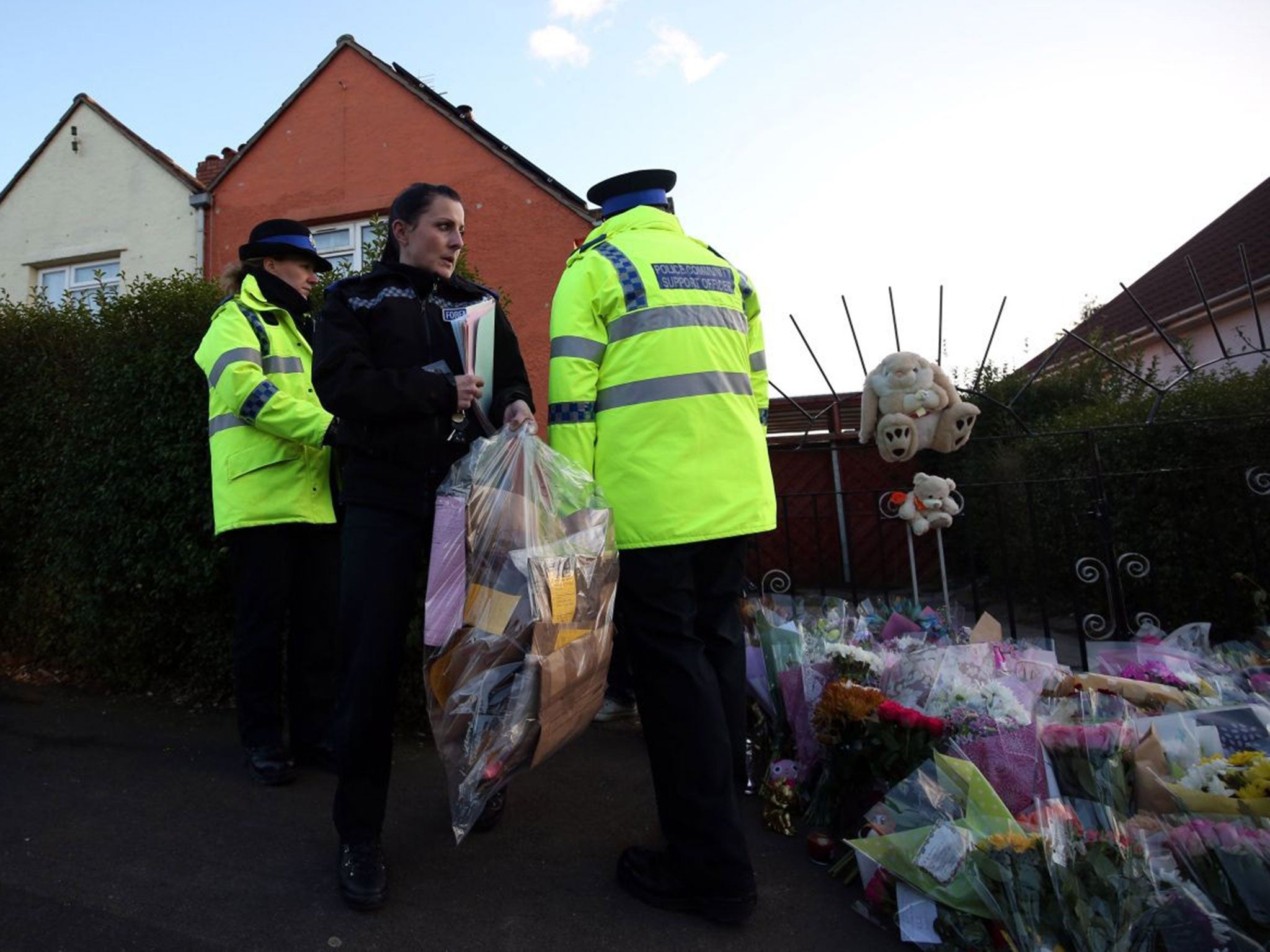 Flowers are left outside of Becky Watt's home