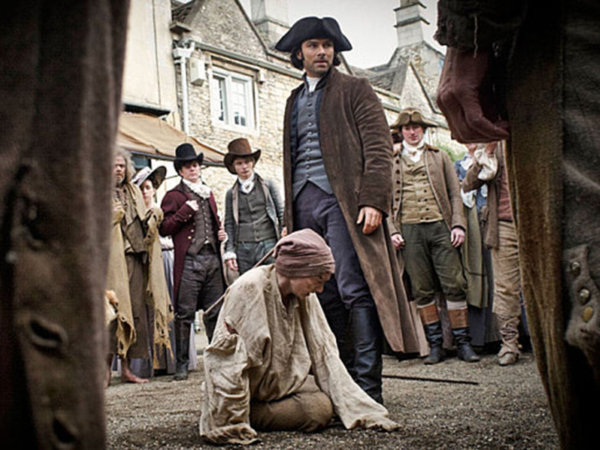 A burglar alarm can be seen in the background of this BBC Poldark press shot