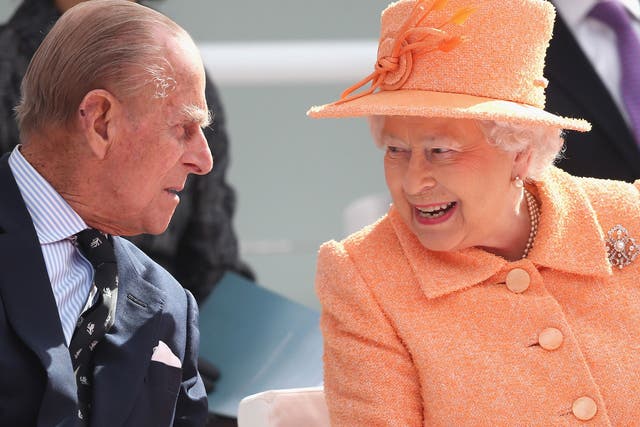 The Queen Elizabeth chats to Prince Philip as the Royal couple take part in the naming ceremony for the P&O Cruises vessel at Ocean Cruise Terminal in Southampton, England. Britannia will carry over 3647 passengers and at 141,000 tonnes she will boost P&O