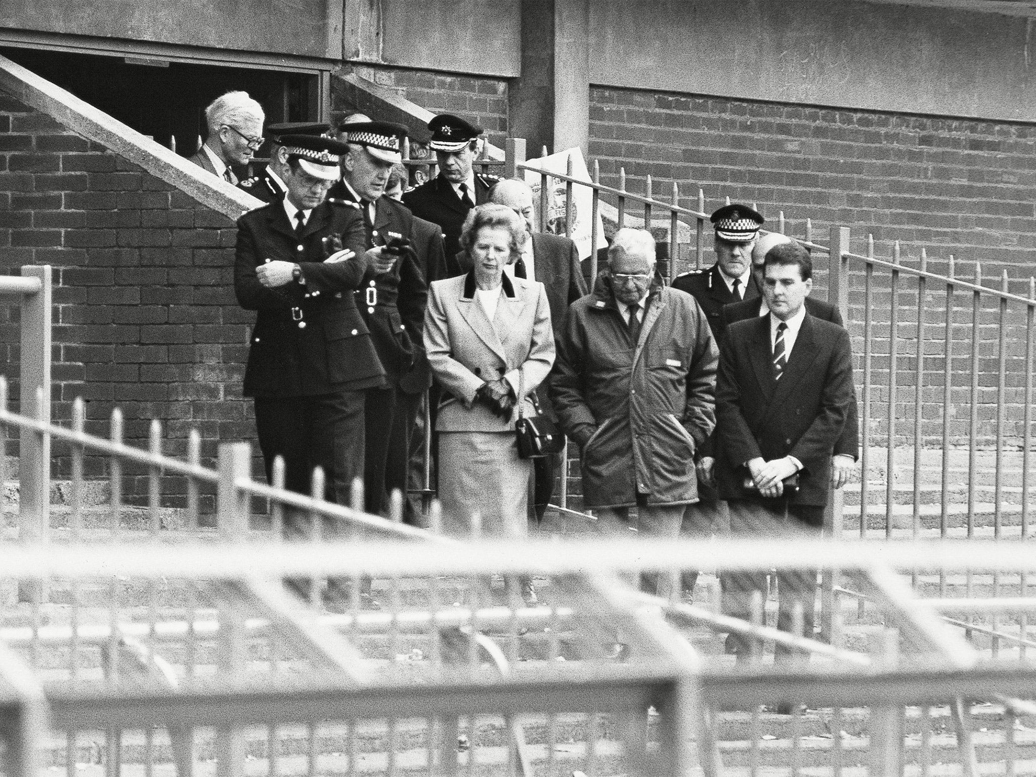 David Duckenfield (front, far left) with Margaret Thatcher at Hillsborough after the disaster (Rex)