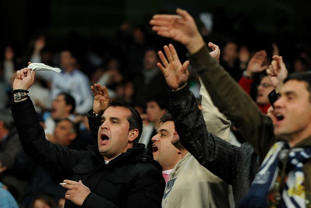 Real Madrid fans gesticulate in frustration
