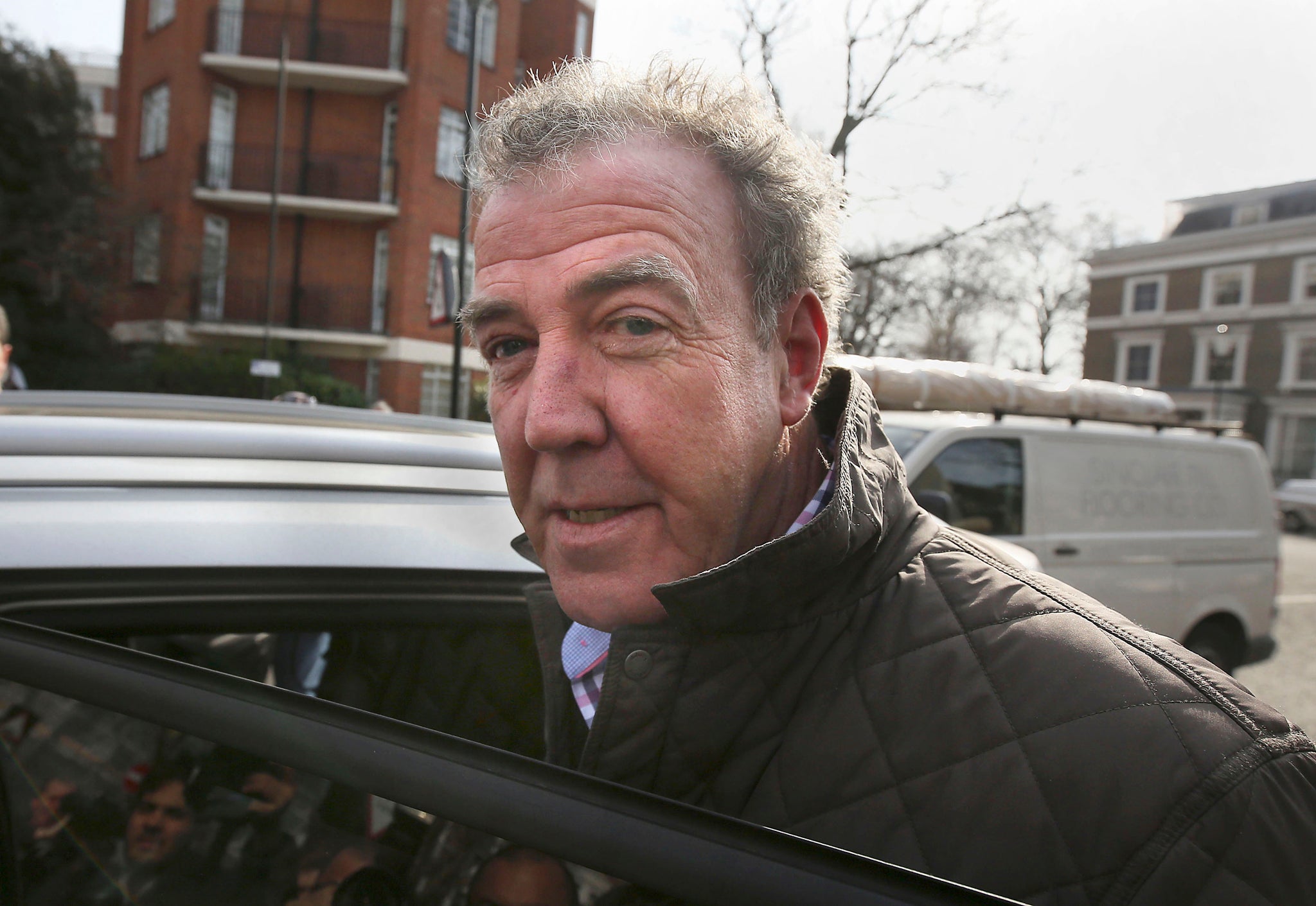 Jeremy Clarkson leaves his home in London, as he laughed off his latest controversy telling reporters he was 'just off to the job centre' after the BBC suspended him following a row with a Top Gear producer.