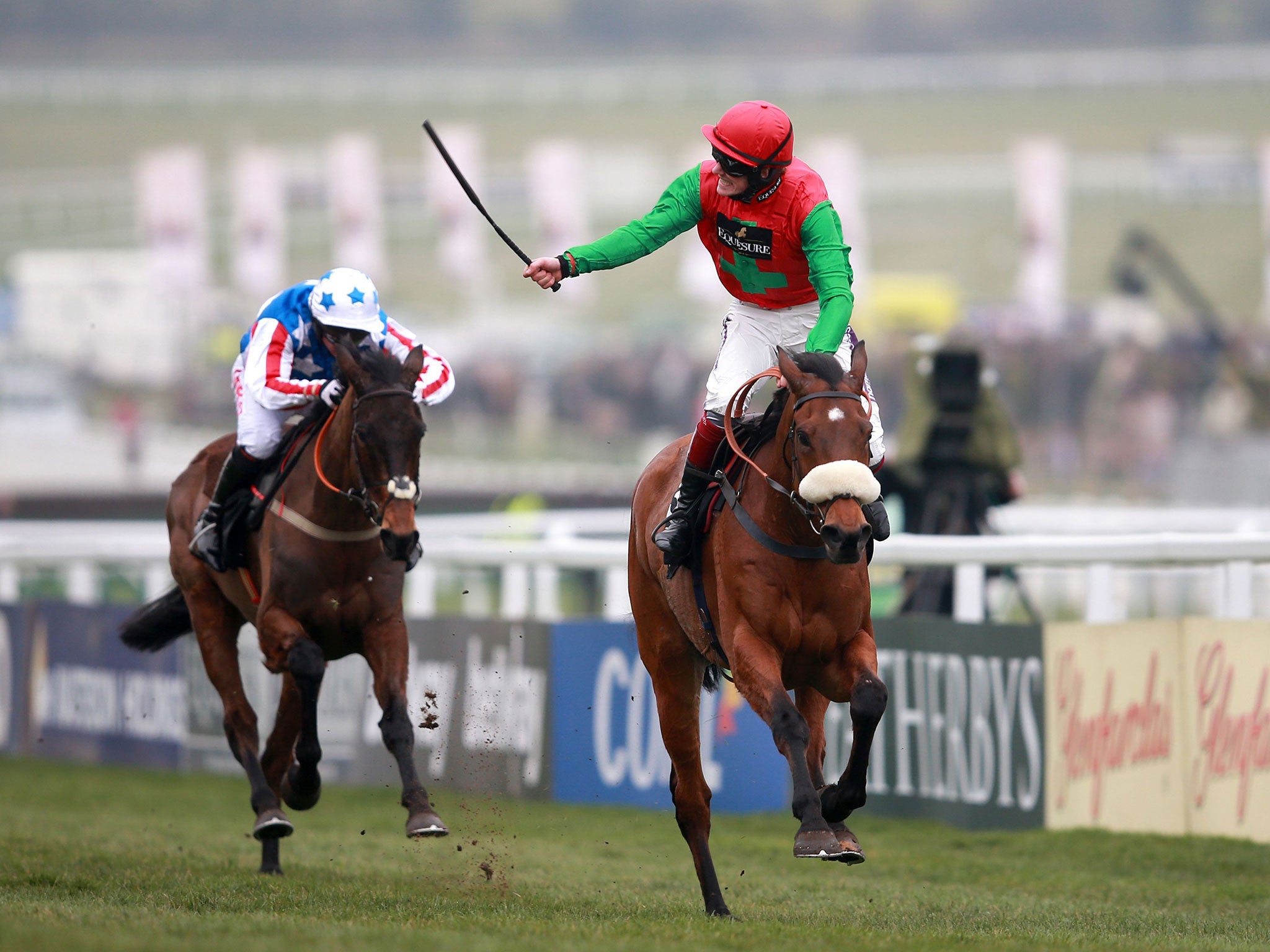 Twiston-Davies celebrates victory in the Queen Mother Champion Chase on Dodging Bullets