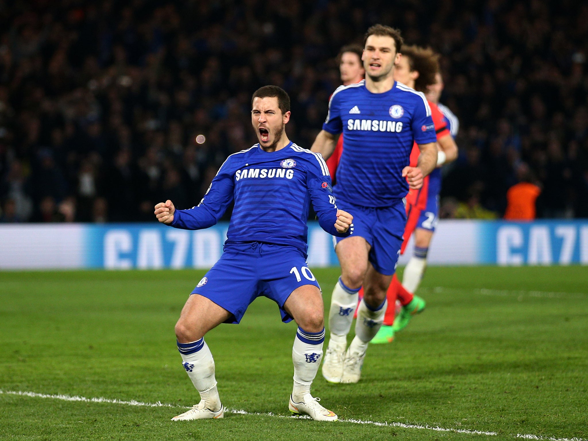 Eden Hazard celebrates after scoring from the spot in extra-time
