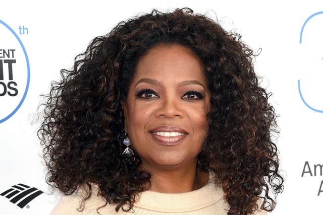 Oprah Winfrey is auctioning off designer pieces from her closet for charity.