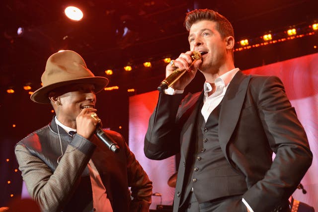 Pharrell Williams and Robin Thicke perform their 2013 hit 'Blurred Lines'
