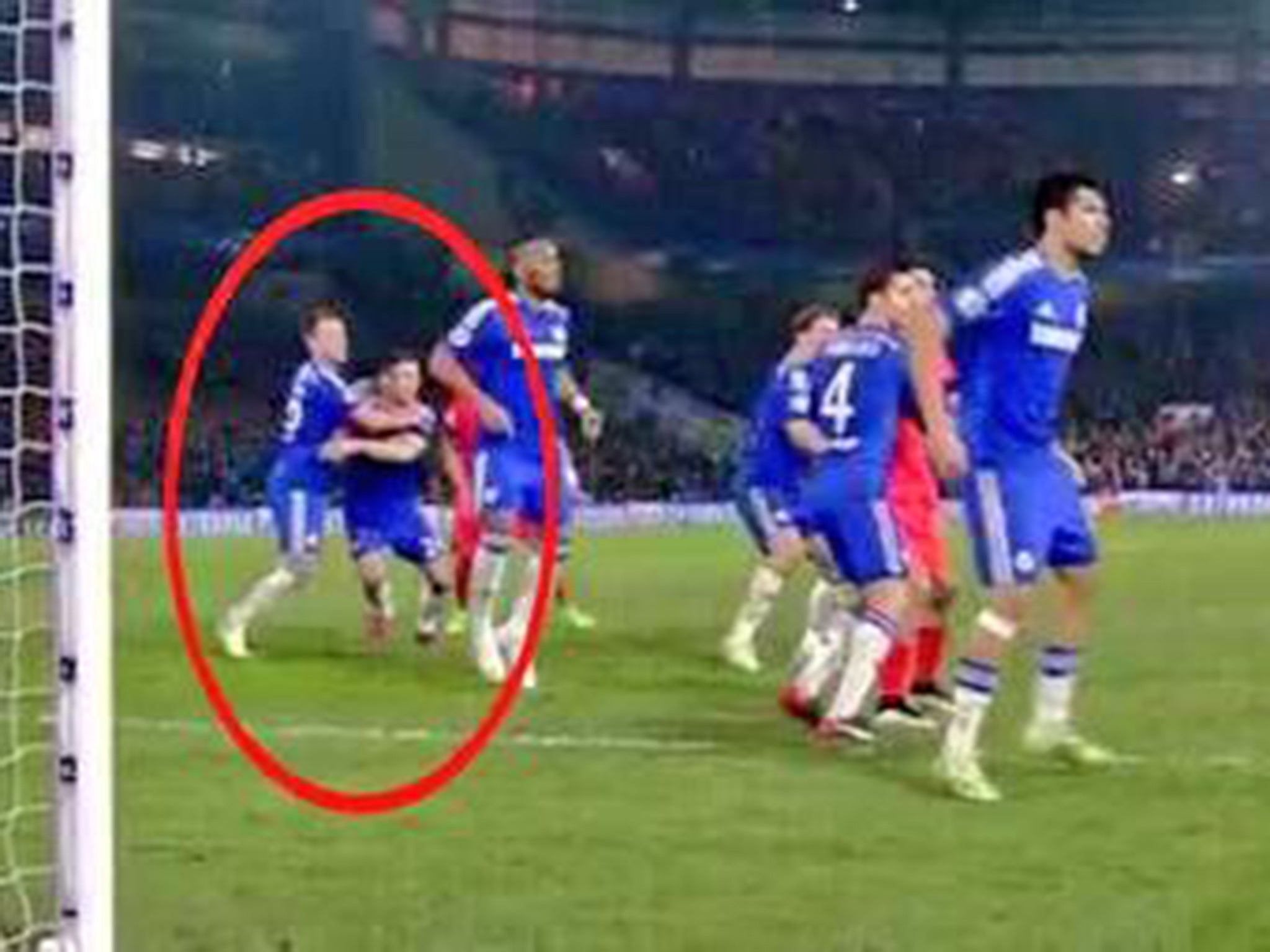 Terry grabs Cahill just before Silva's crucial goal