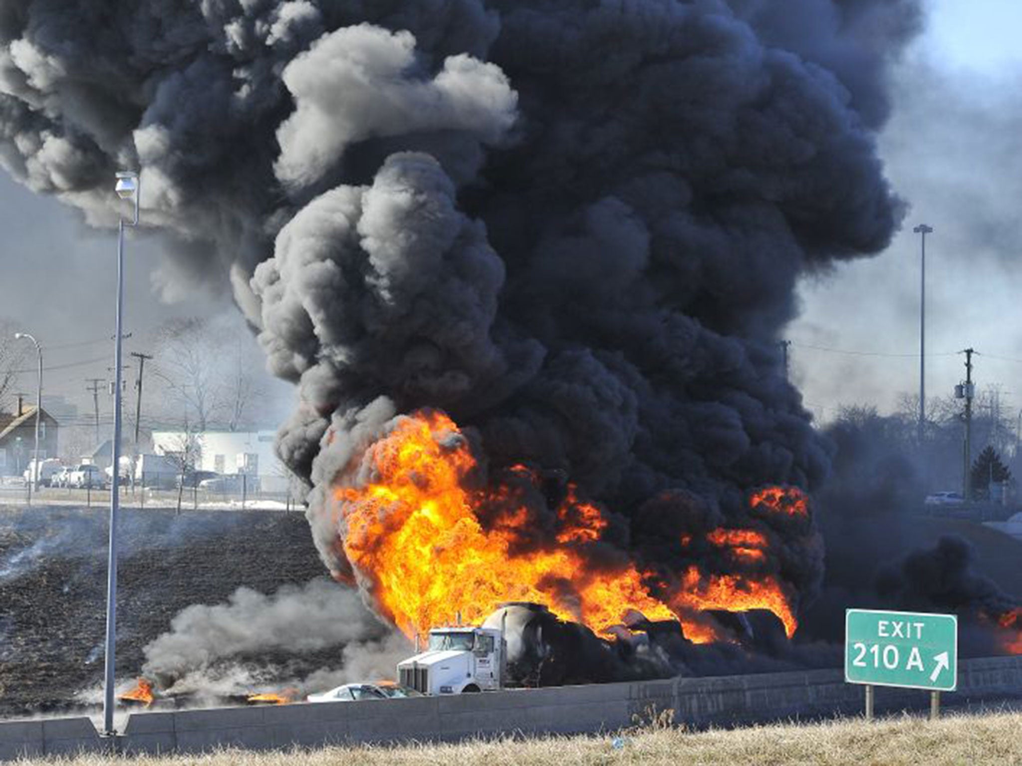 The tanker truck burns on Detroit's busy Interstate 54