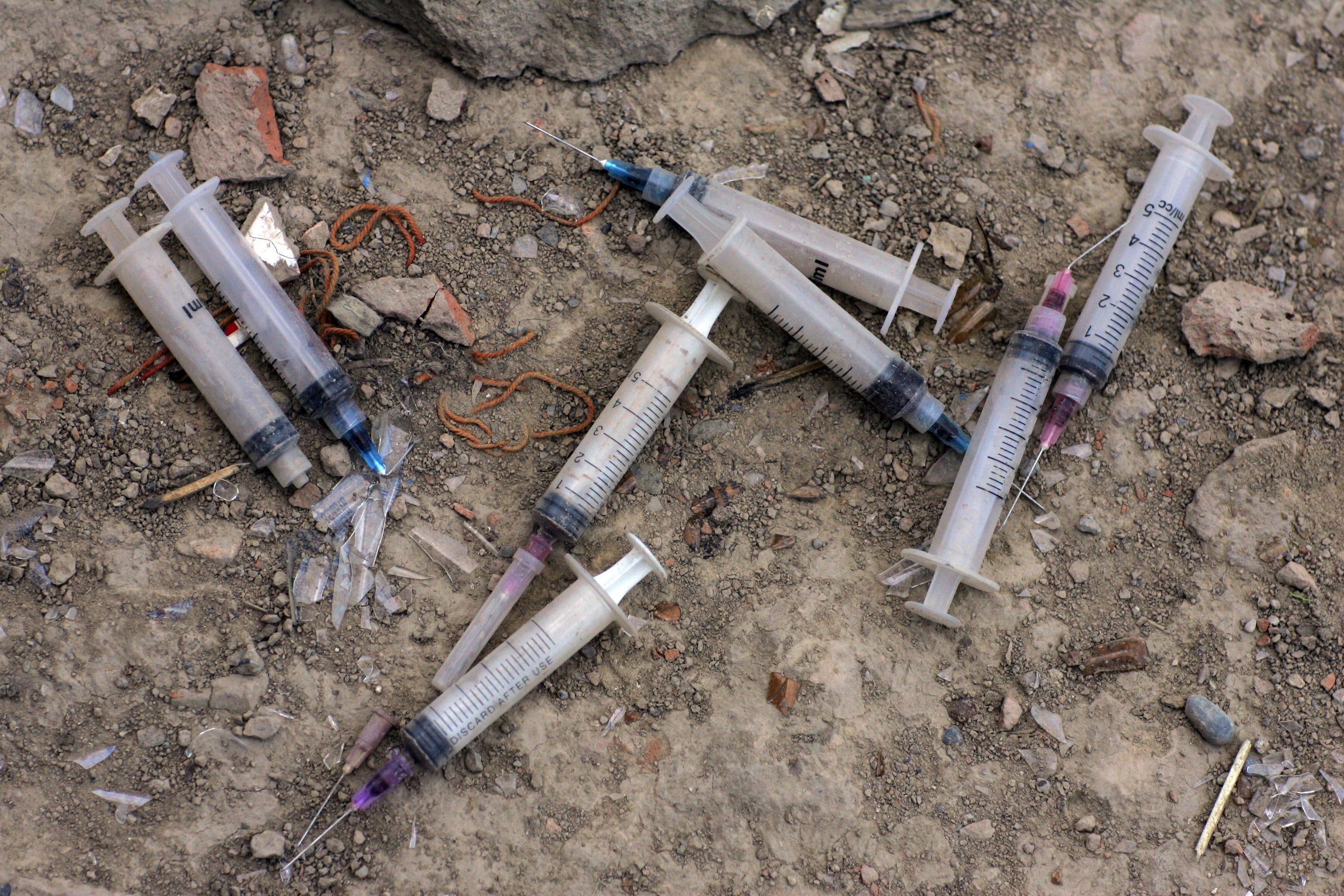 Used heroin needles discarded on the ground