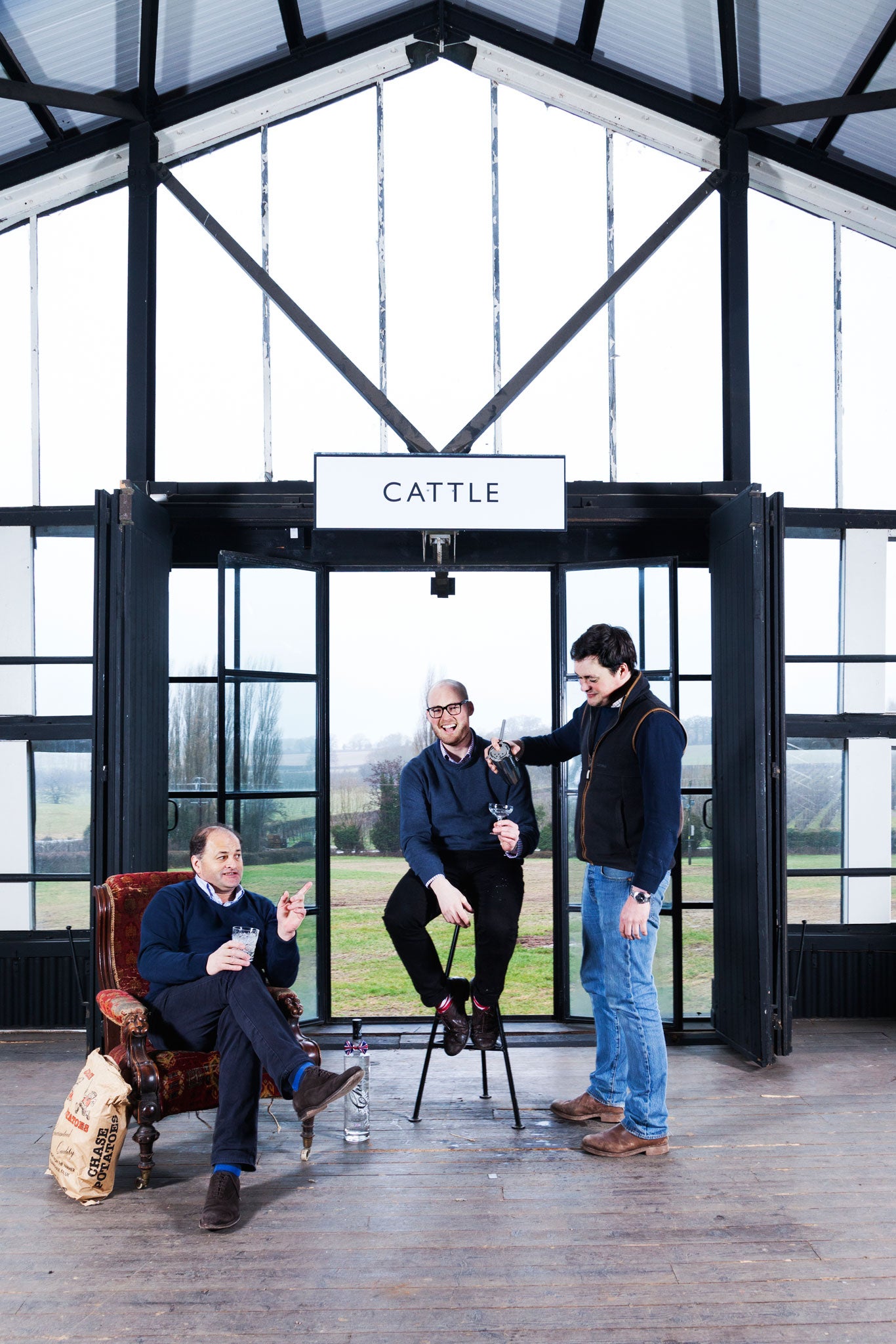 Toasting their success: William, James and Harry Chase at the distillery