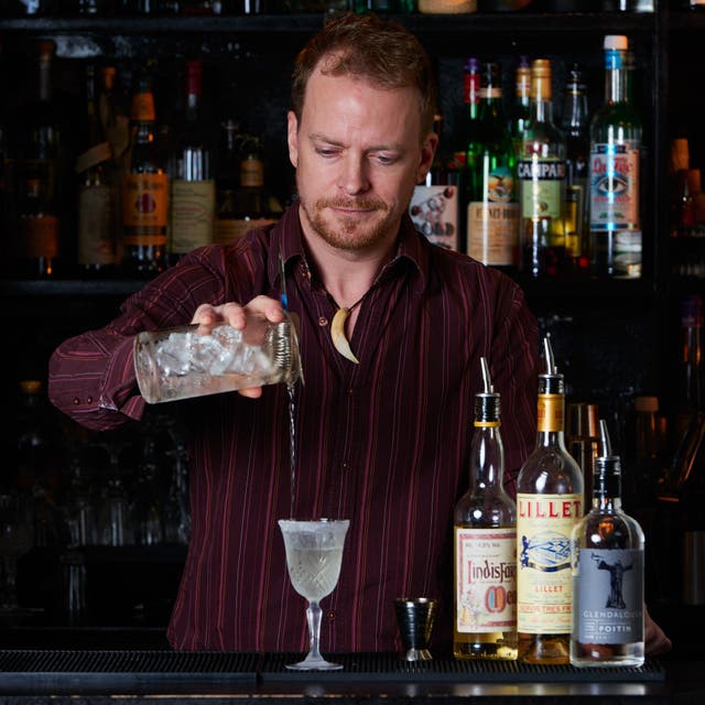 Jim Wrigley, of Reverend JW Simpson, prepares a poteen cocktail