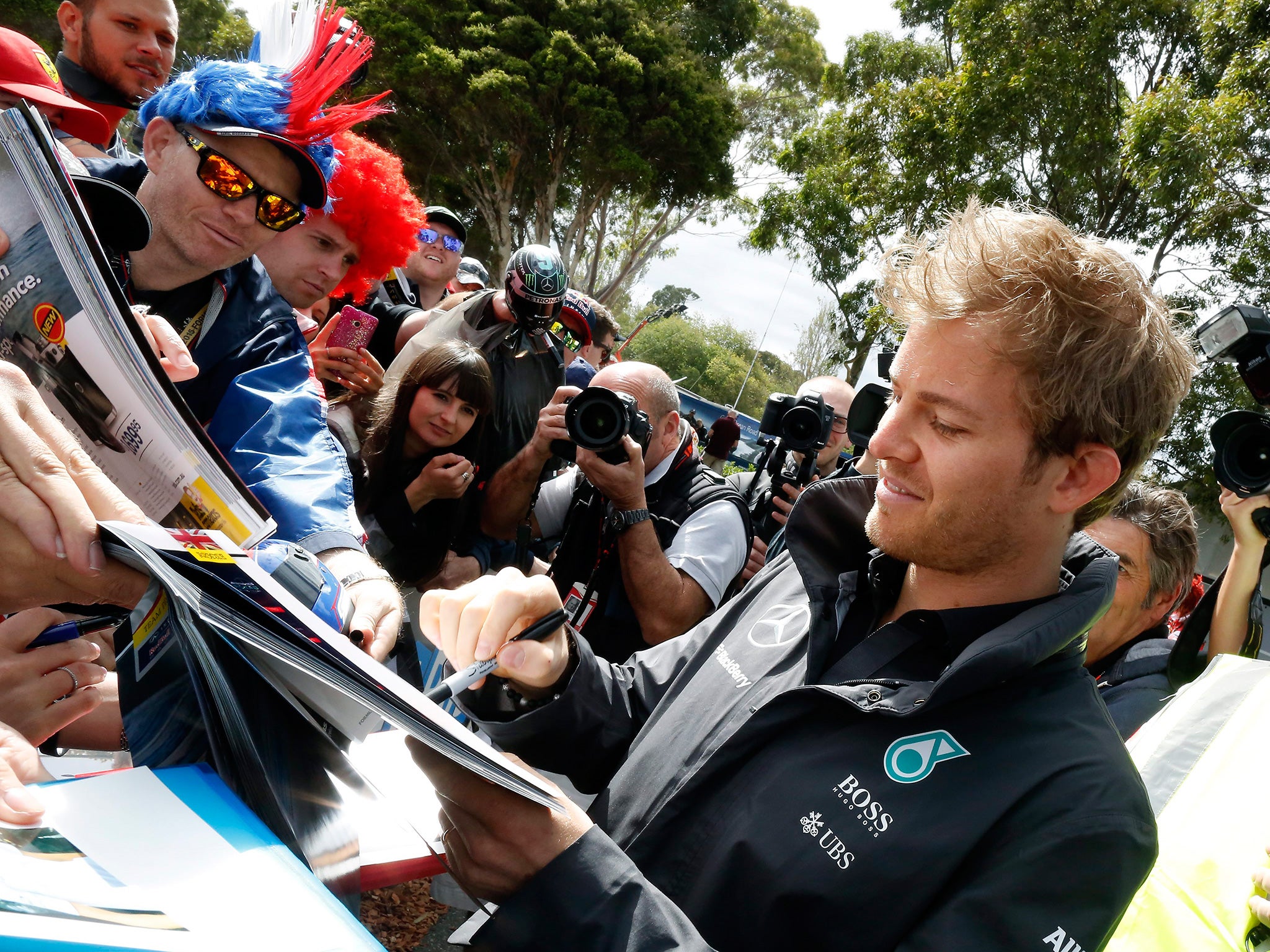 Mercedes’ Nico Rosberg signs autographs at the Albert Park circuit in Melbourne