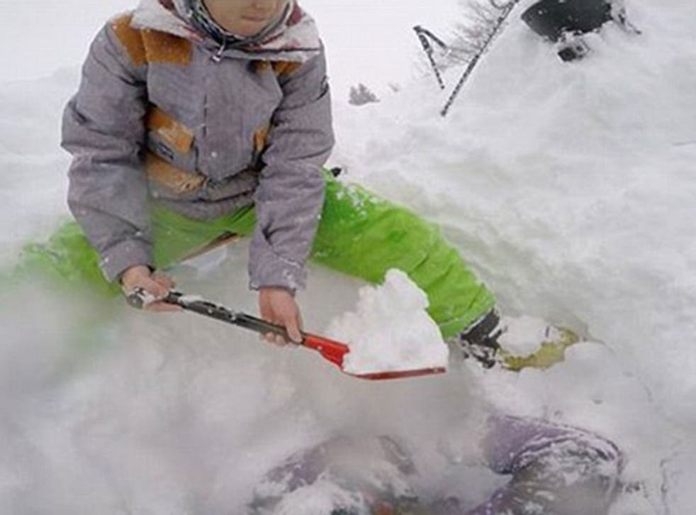 It took an hour for Swiss ski patrol officers to dig Mort from under the snow (Youtube)