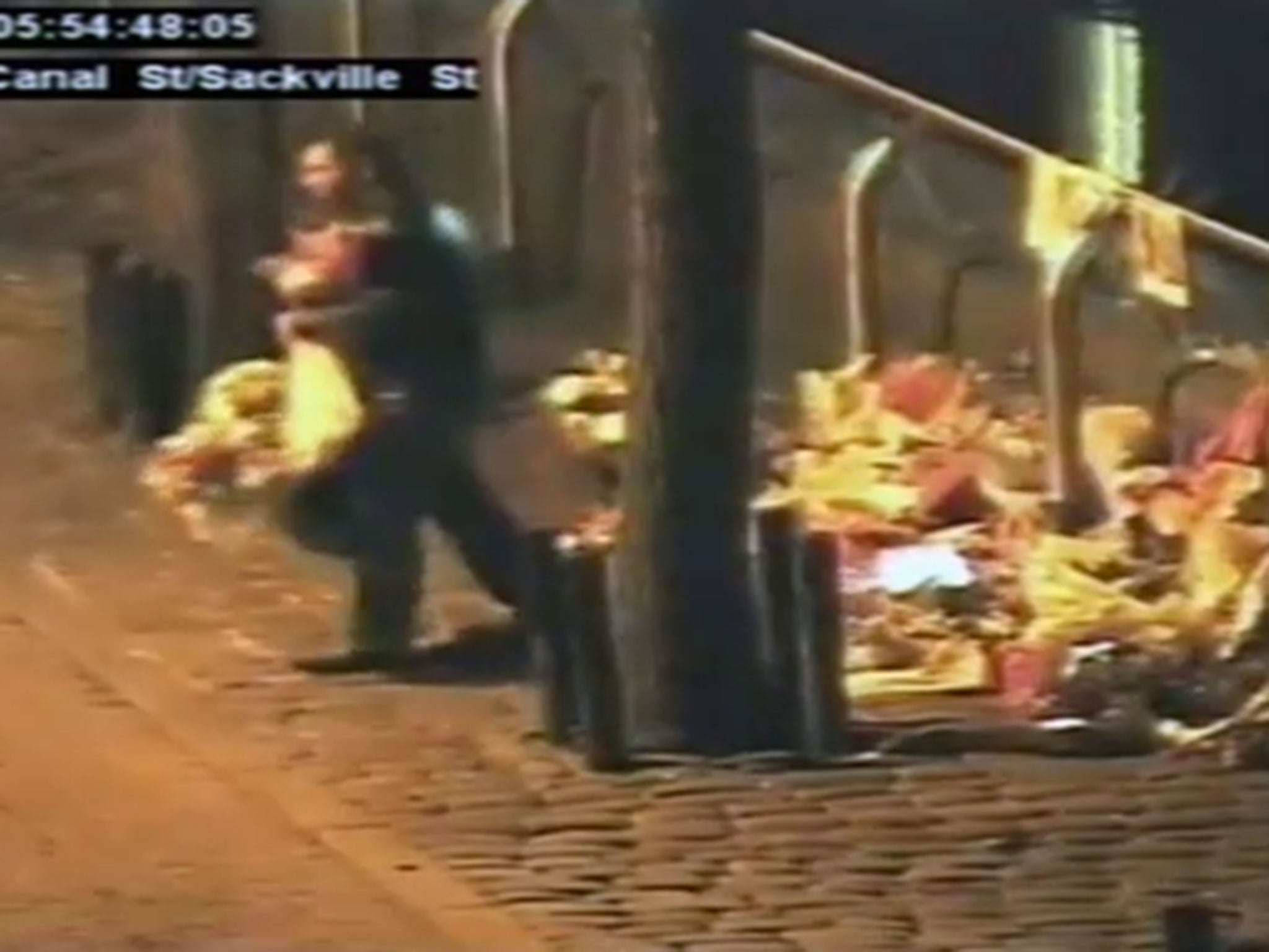 The man was captured on CCTV stealing flowers from the site