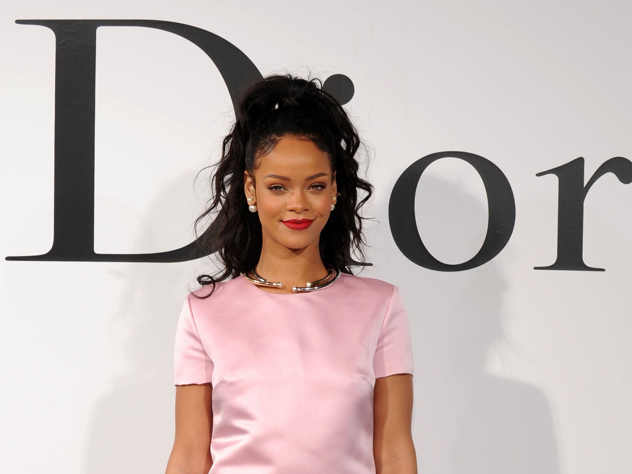 Rihanna attends the Christian Dior Cruise 2015 show in Brooklyn