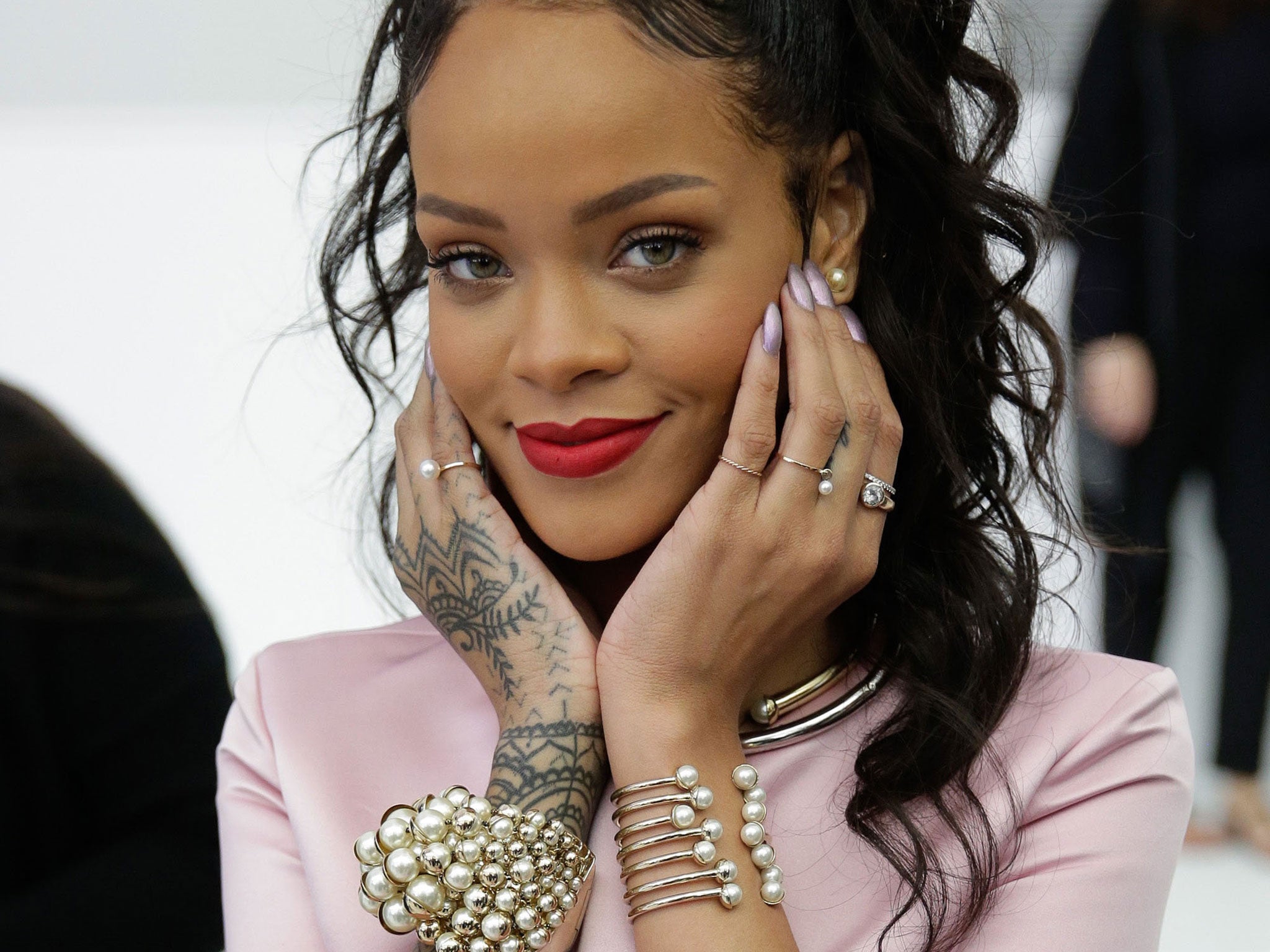 Rihanna attends the Christian Dior Cruise 2015 show at Brooklyn Navy Yard