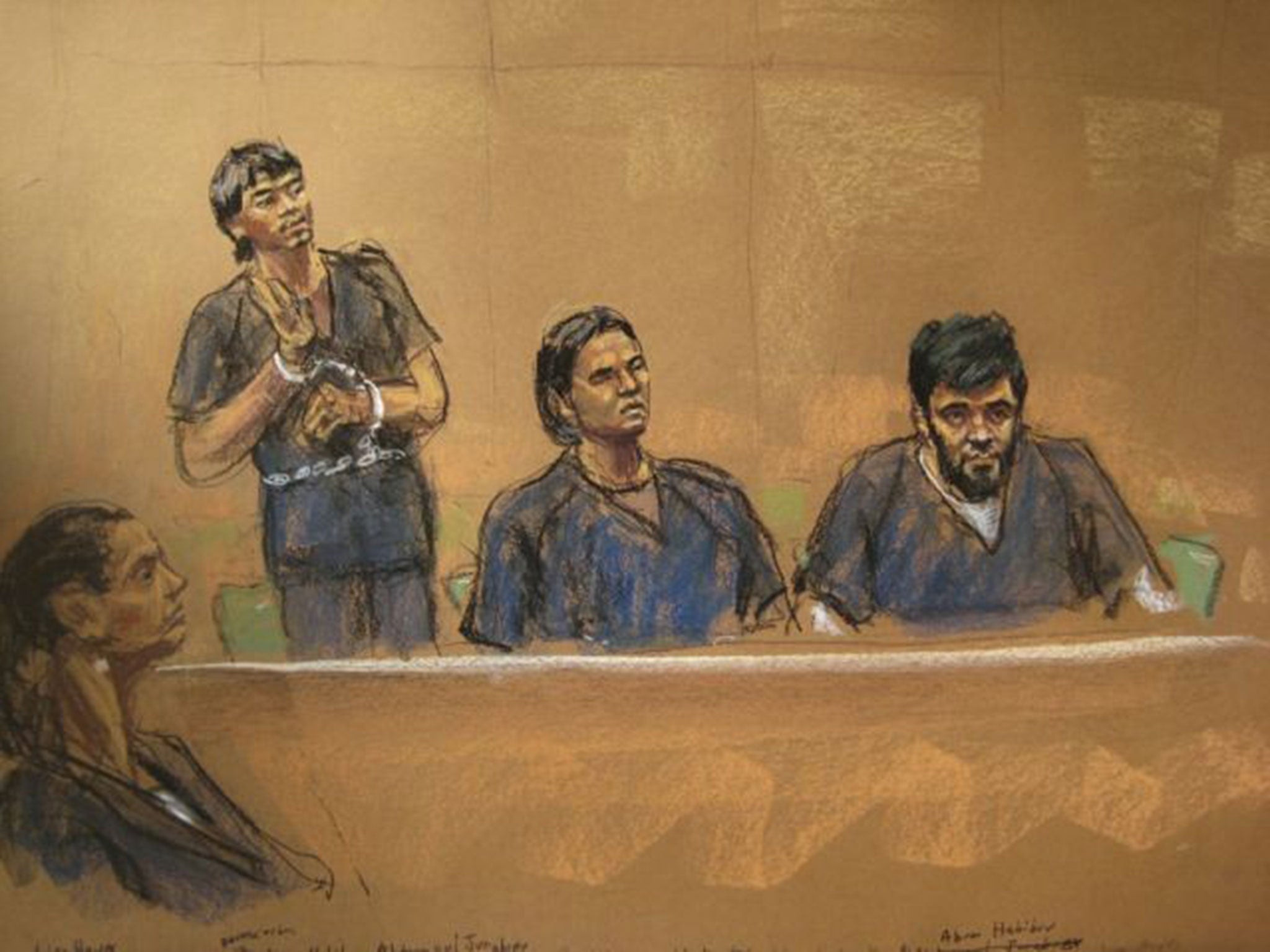 Attorney Lis Hoyes (L to R), looks on as Abdurasul Juraboev, Akhror Saidakmetov and Abror Habibov appear in this courtroom sketch during their arraignment in Brooklyn Federal Court in New York, March 13, 2015