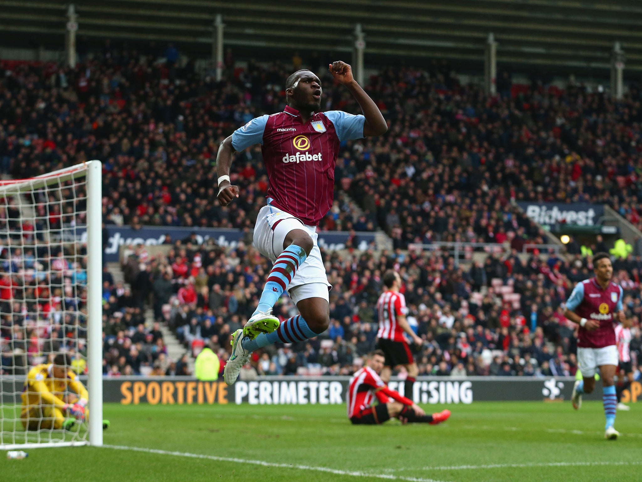 Christian Benteke of Aston Villa celebrates scoring their fourth goal