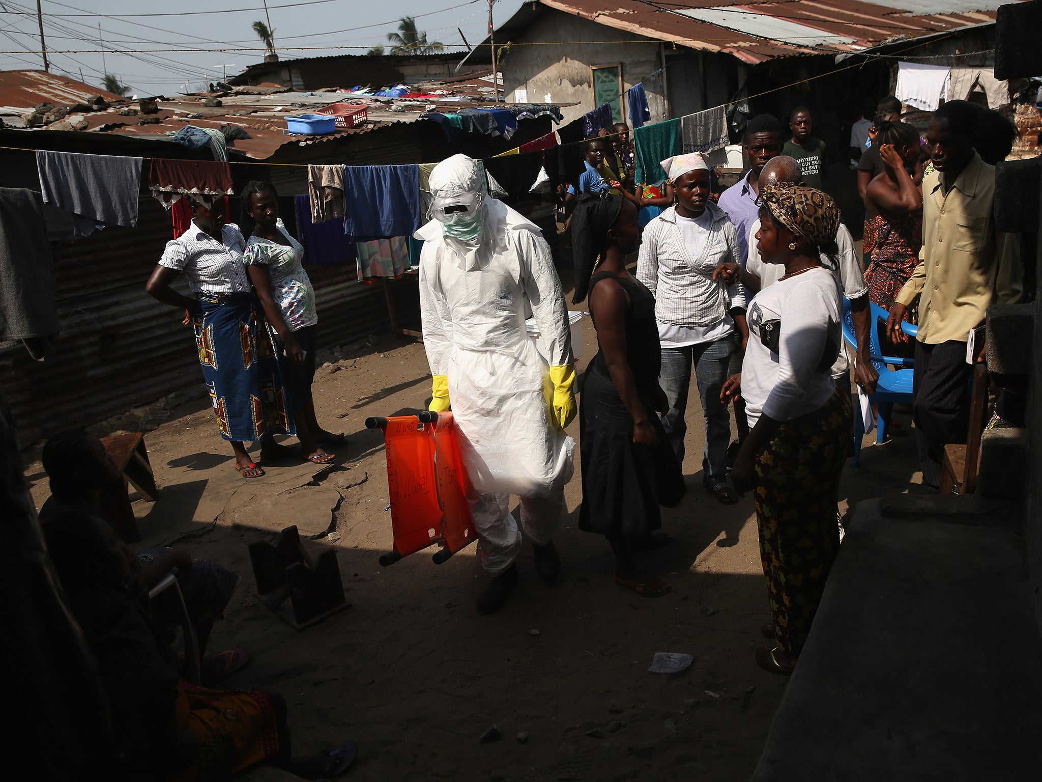 Health workers help tackle the Ebola outbreak in 2015.