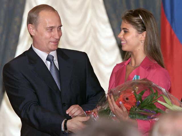 <p>An archive picture Putin and former gymnast Alina Kabaeva  who is alleged to be his lover </p>