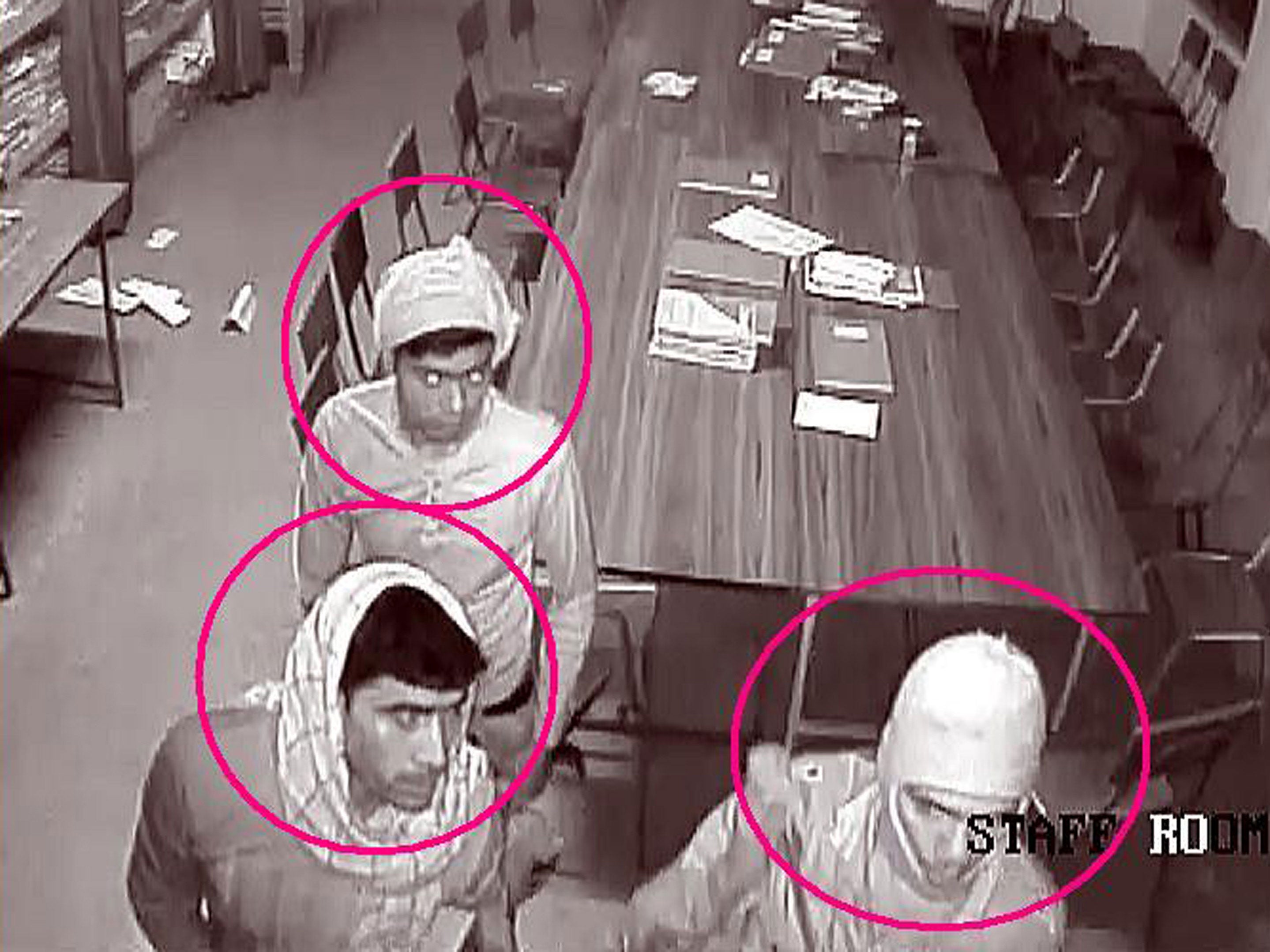 This closed circuit television image released by West Bengal Police shows three suspects in the rape of an elderly nun at the convent