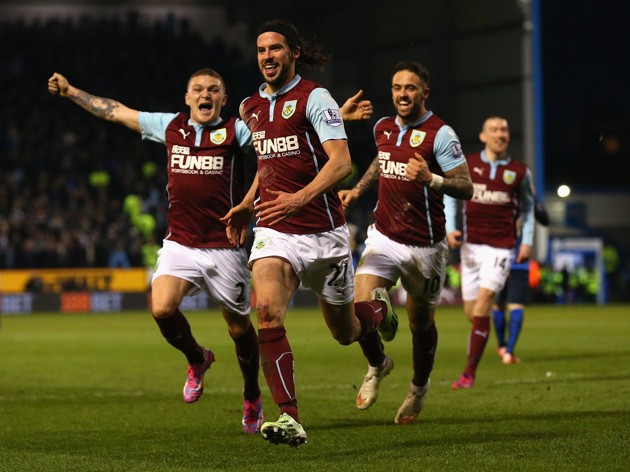 George Boyd, second left, celebrates his winning goal with Burnley team-mates