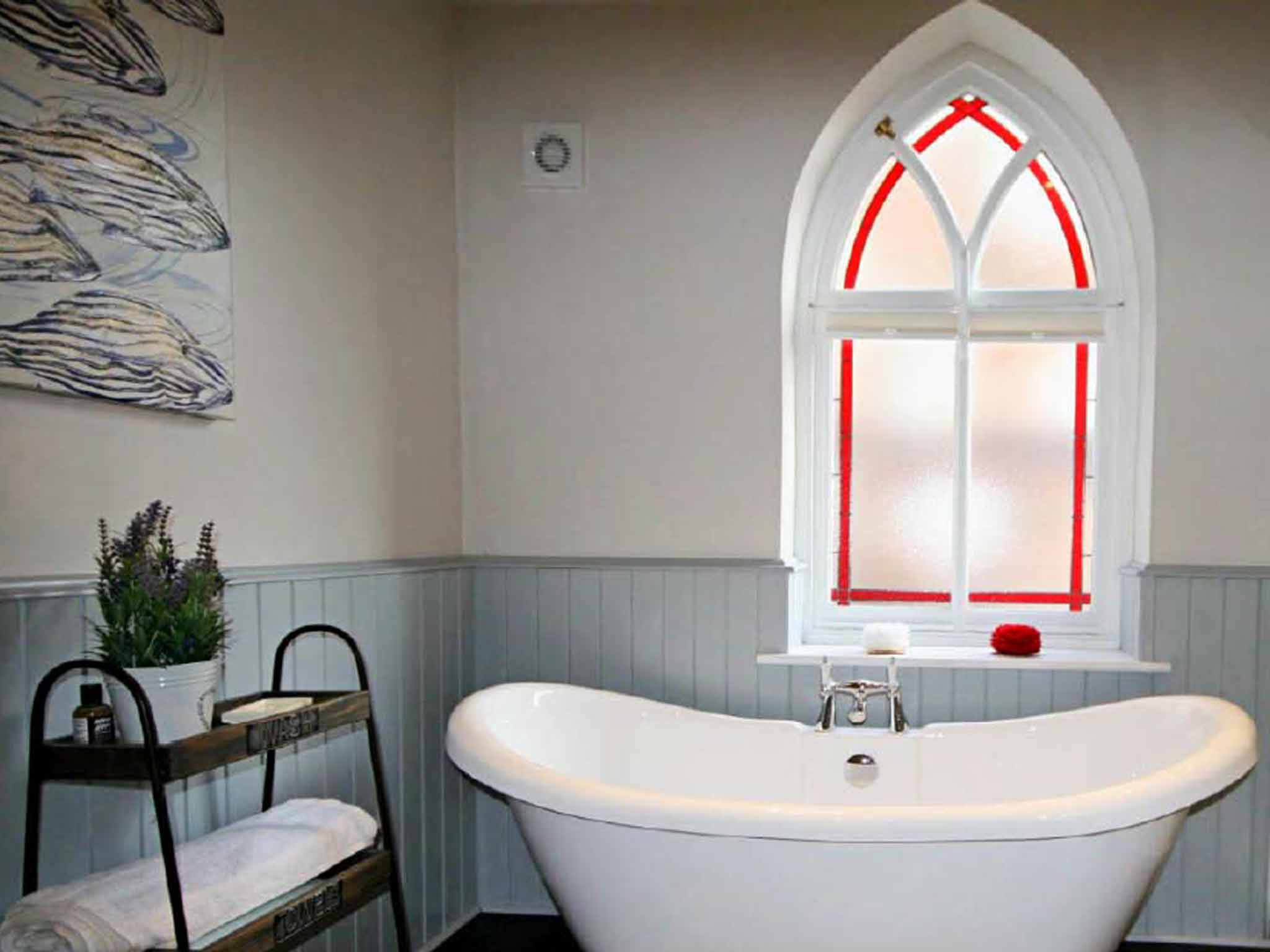 Bathe by the chapel's original stained-glass windows