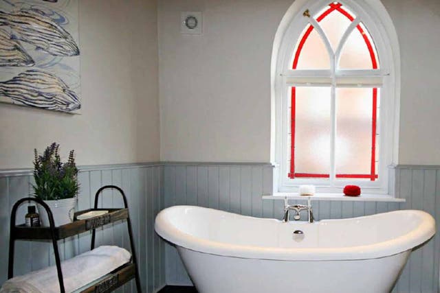 Bathe by the chapel's original stained-glass windows