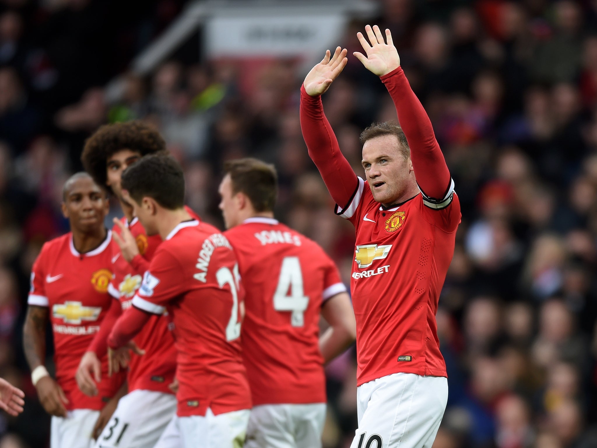 Wayne Rooney celebrates his goal against Tottenham