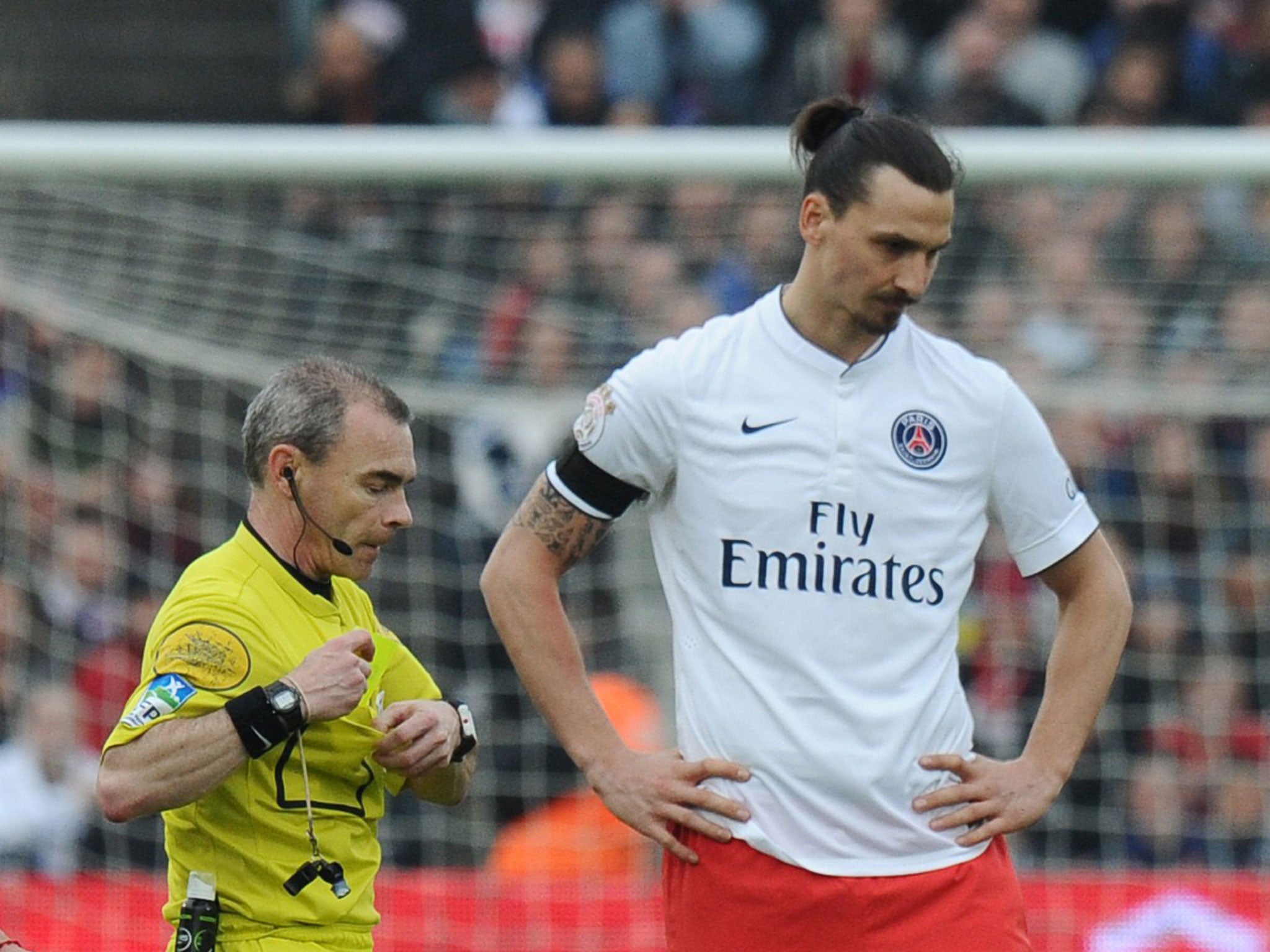 Zlatan Ibrahimovic (right) next to referee Lionel Jaffredo during PSG's loss at Bordeaux on Sunday