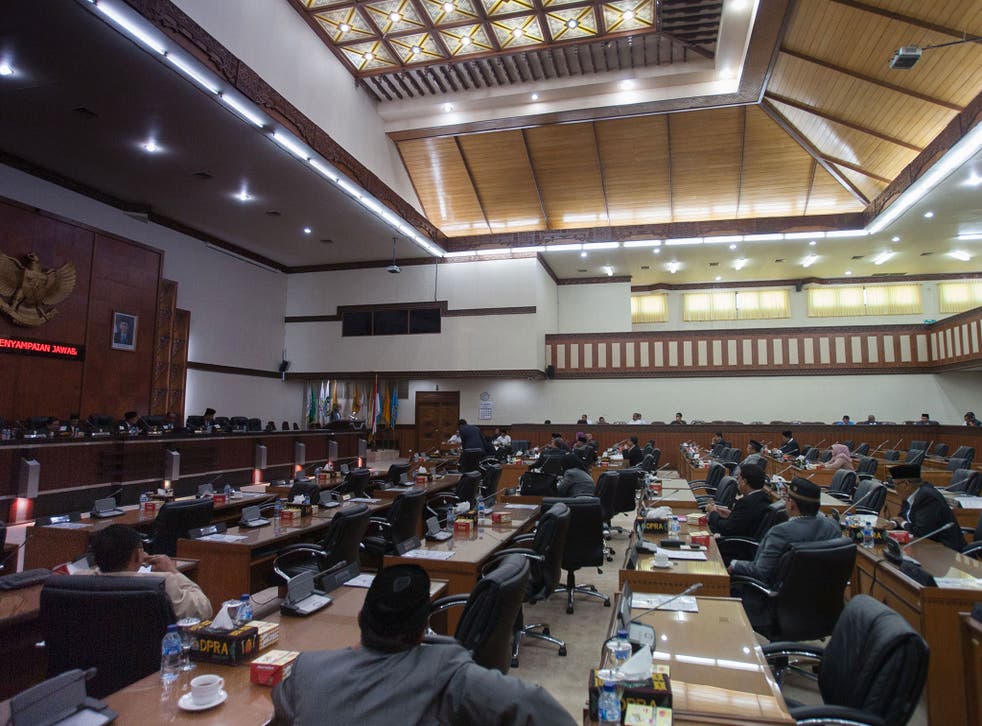 In September the province of Aceh passed an anti-homosexuality by-law under Islamic sharia law. Here Aceh parliament members hold a general meeting on the sharia law