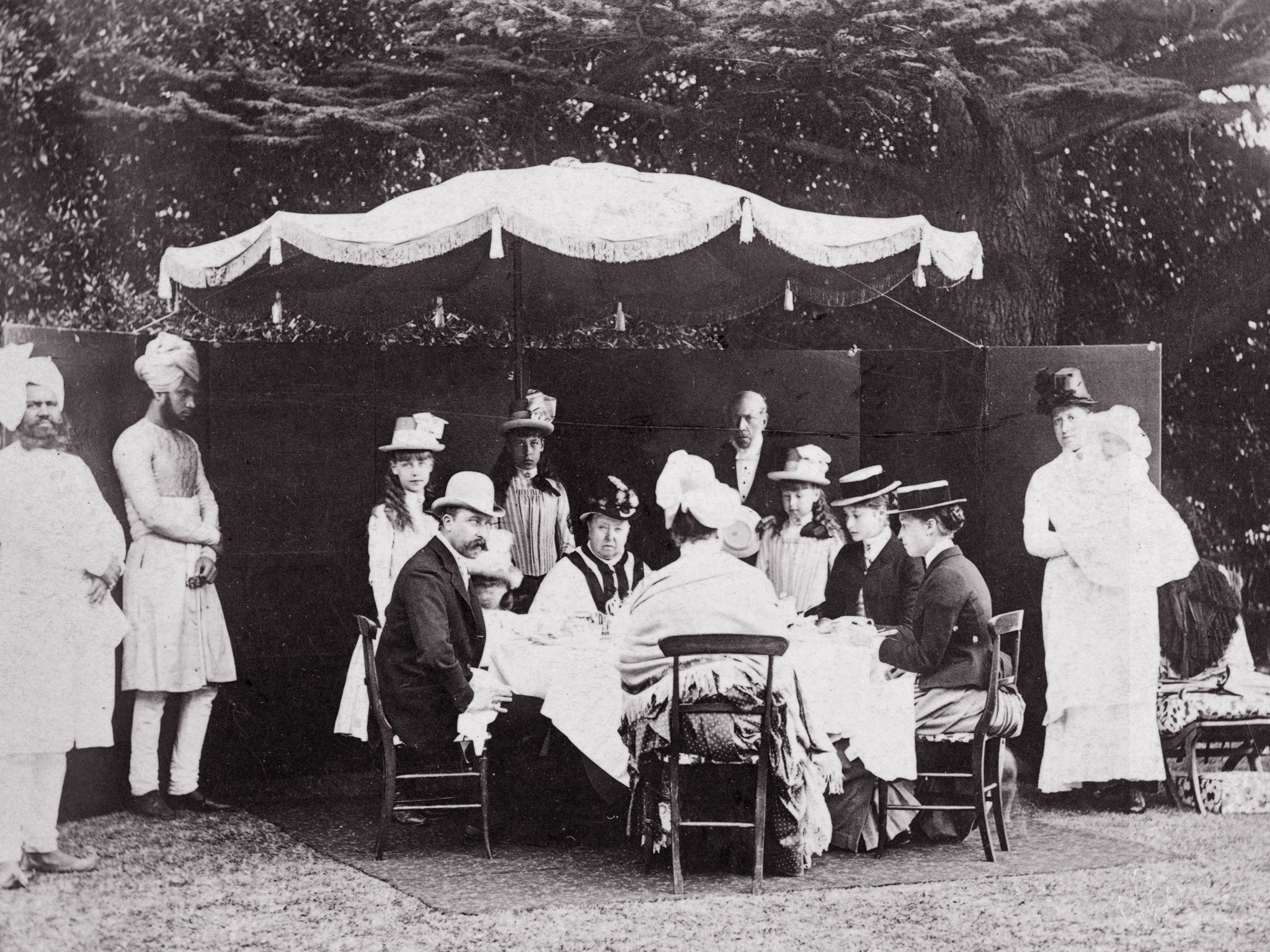 Indian summer: Queen Victoria at a family garden party at Osborne House on the Isle of Wight, with Indian servants