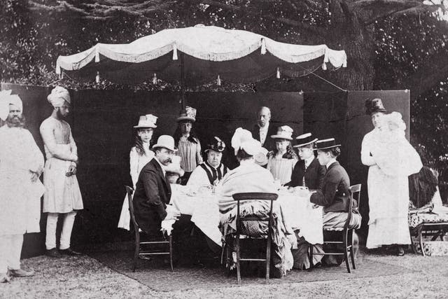 Indian summer: Queen Victoria at a family garden party at Osborne House on the Isle of Wight, with Indian servants 