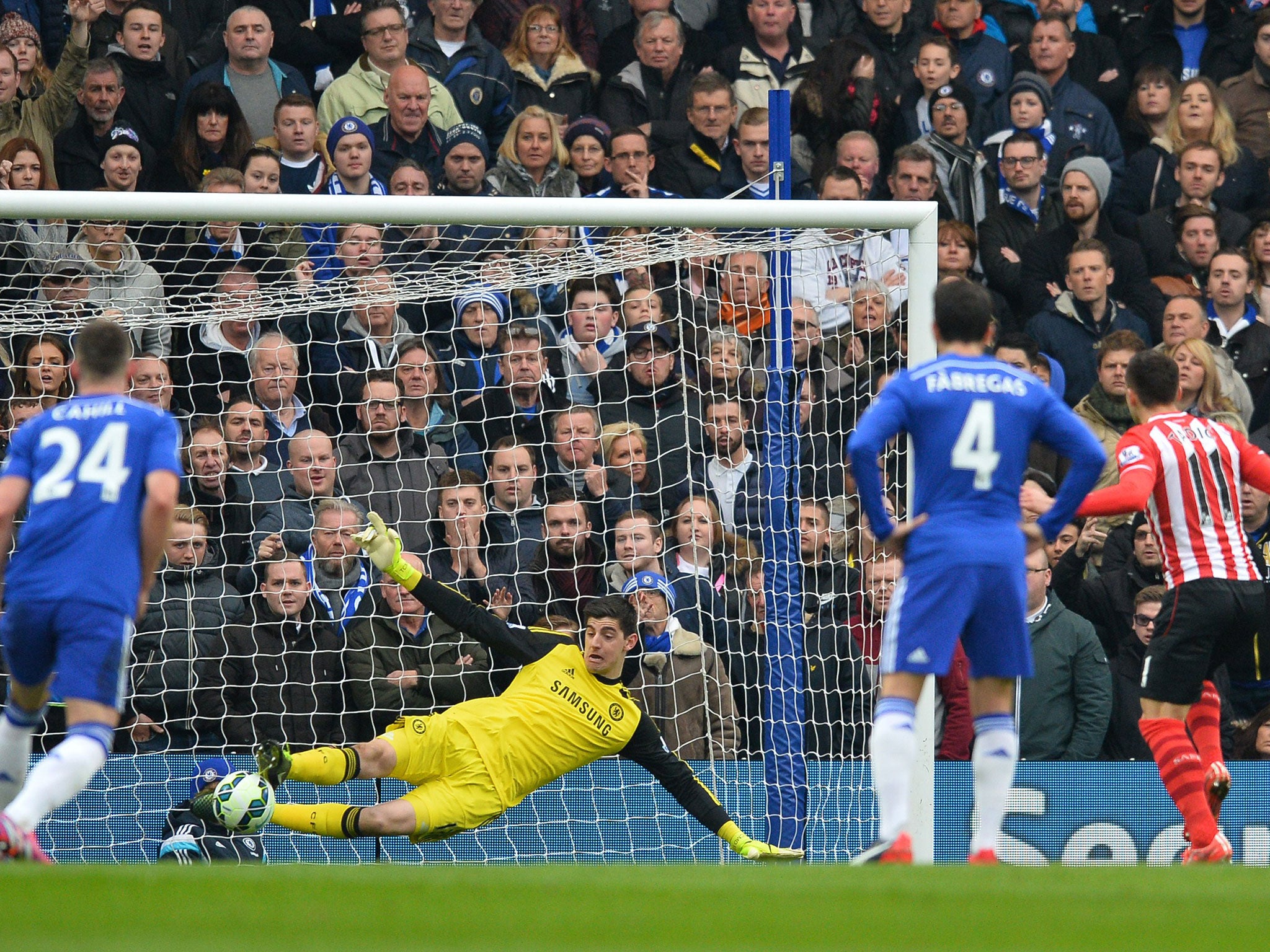 Tadic slots home a penalty to secure a draw with Chelsea