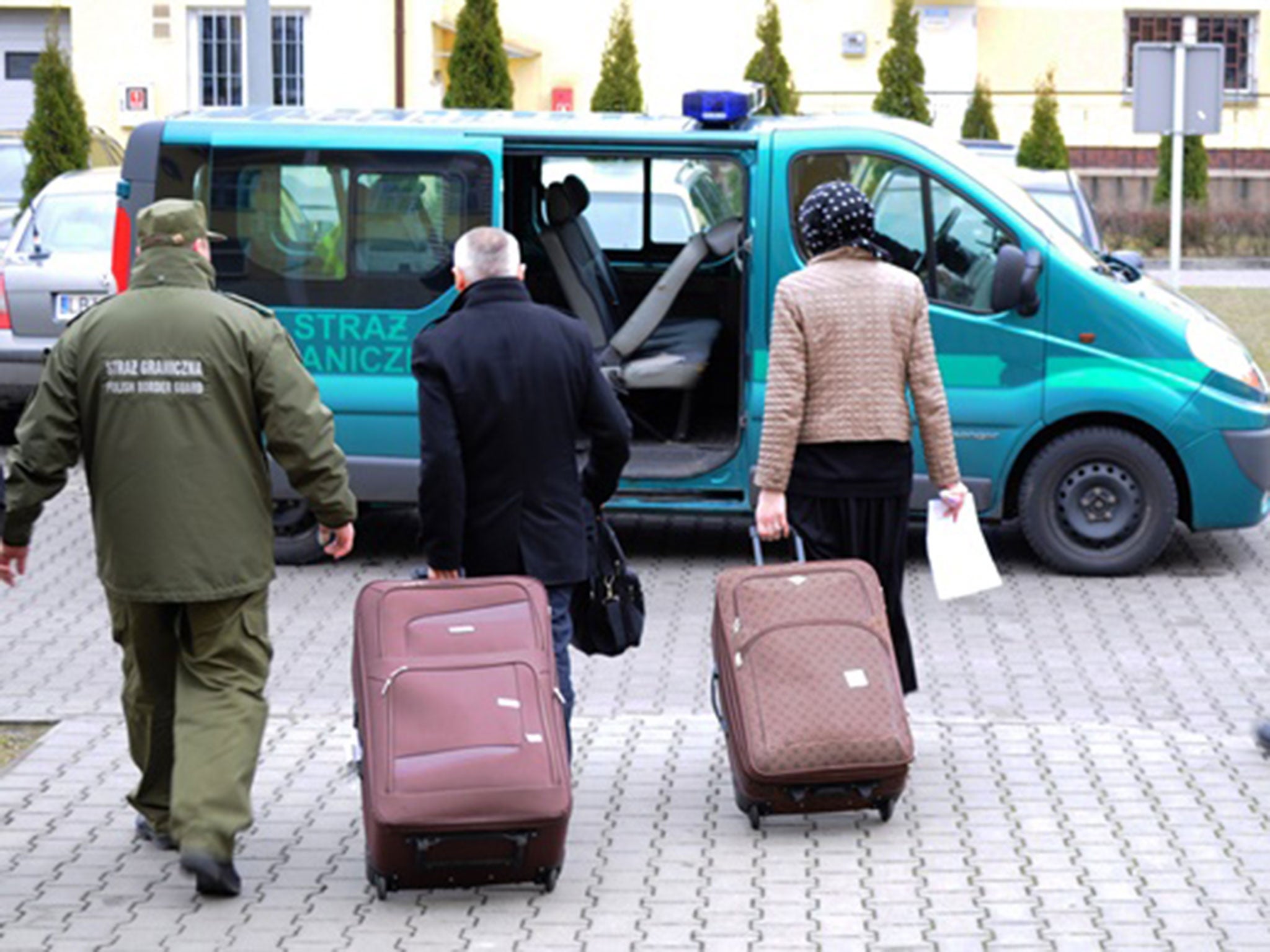 The couple leaving Poland after being interviewed by the national border guard