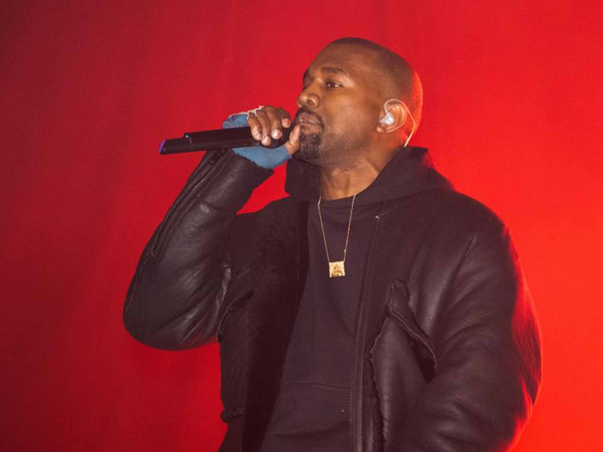 Kanye West, performing in New York last week, has been the subject of controversy as rock's traditional headline slot at Glastonbury is lost once again