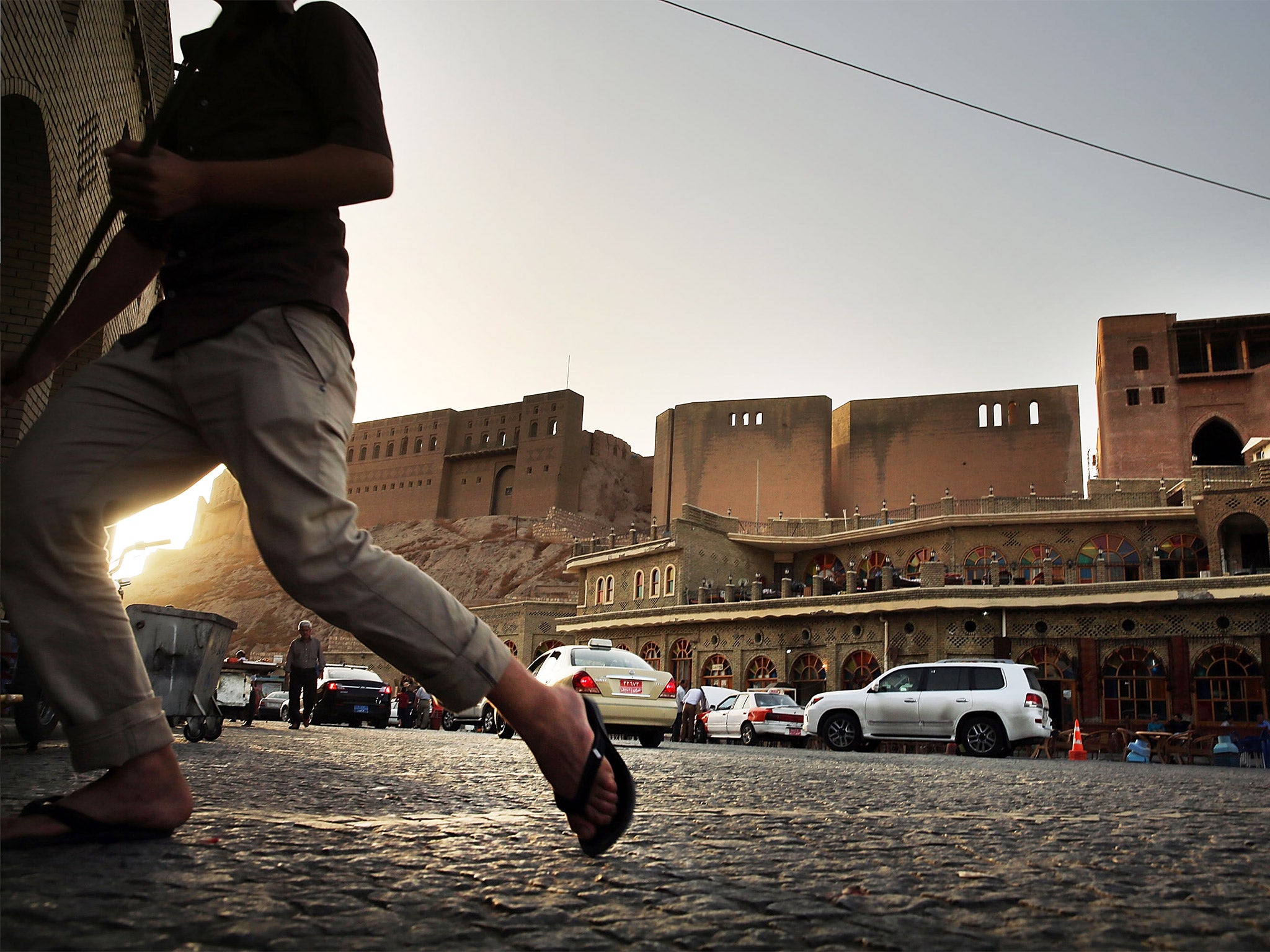 Erbil in Iraq, where tens of thousands of displaced Iraqis and Syrians have come to escape the conflict with Isis