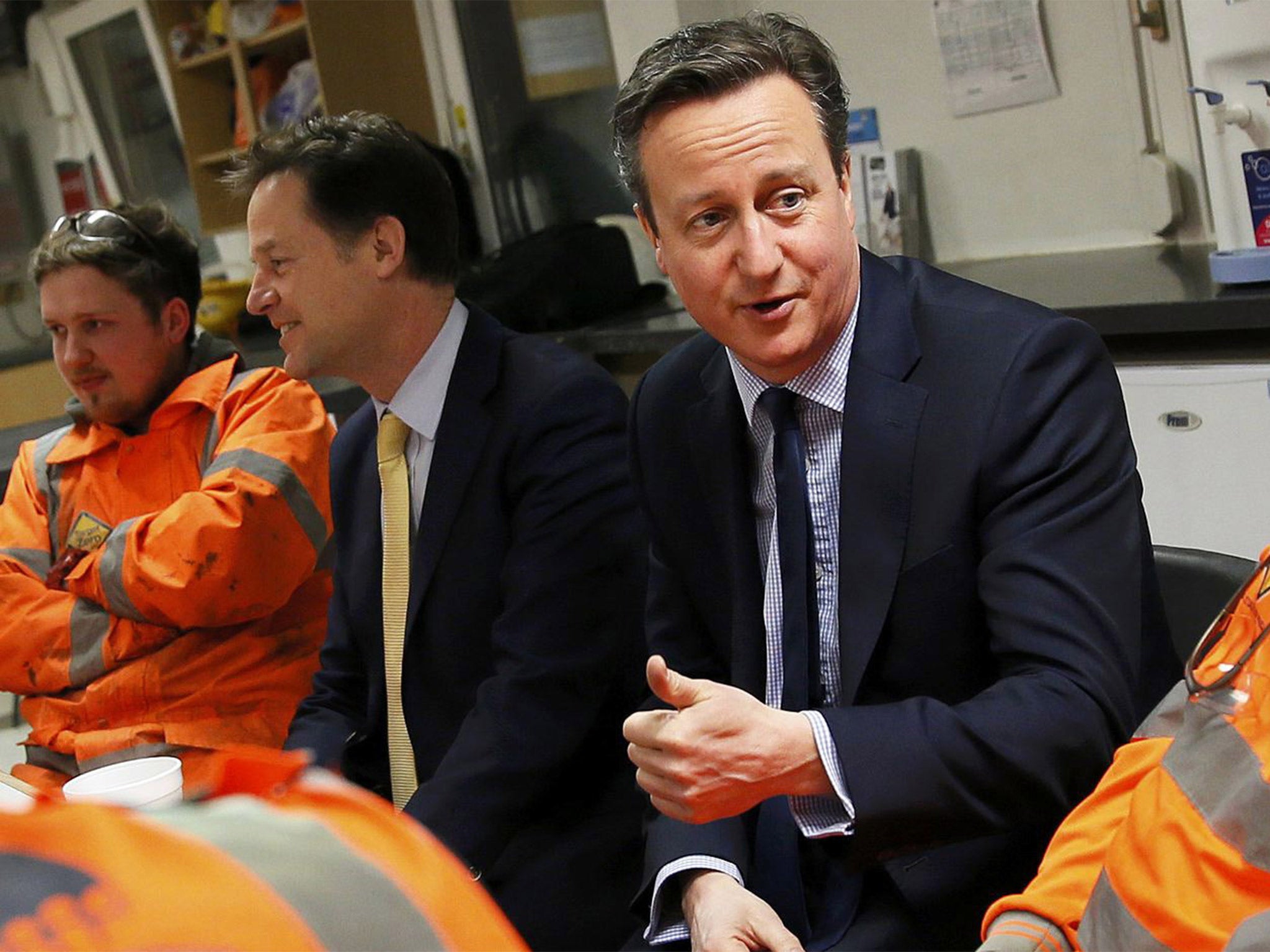 David Cameron and Nick Clegg speak to Crossrail workers in London on Tuesday
