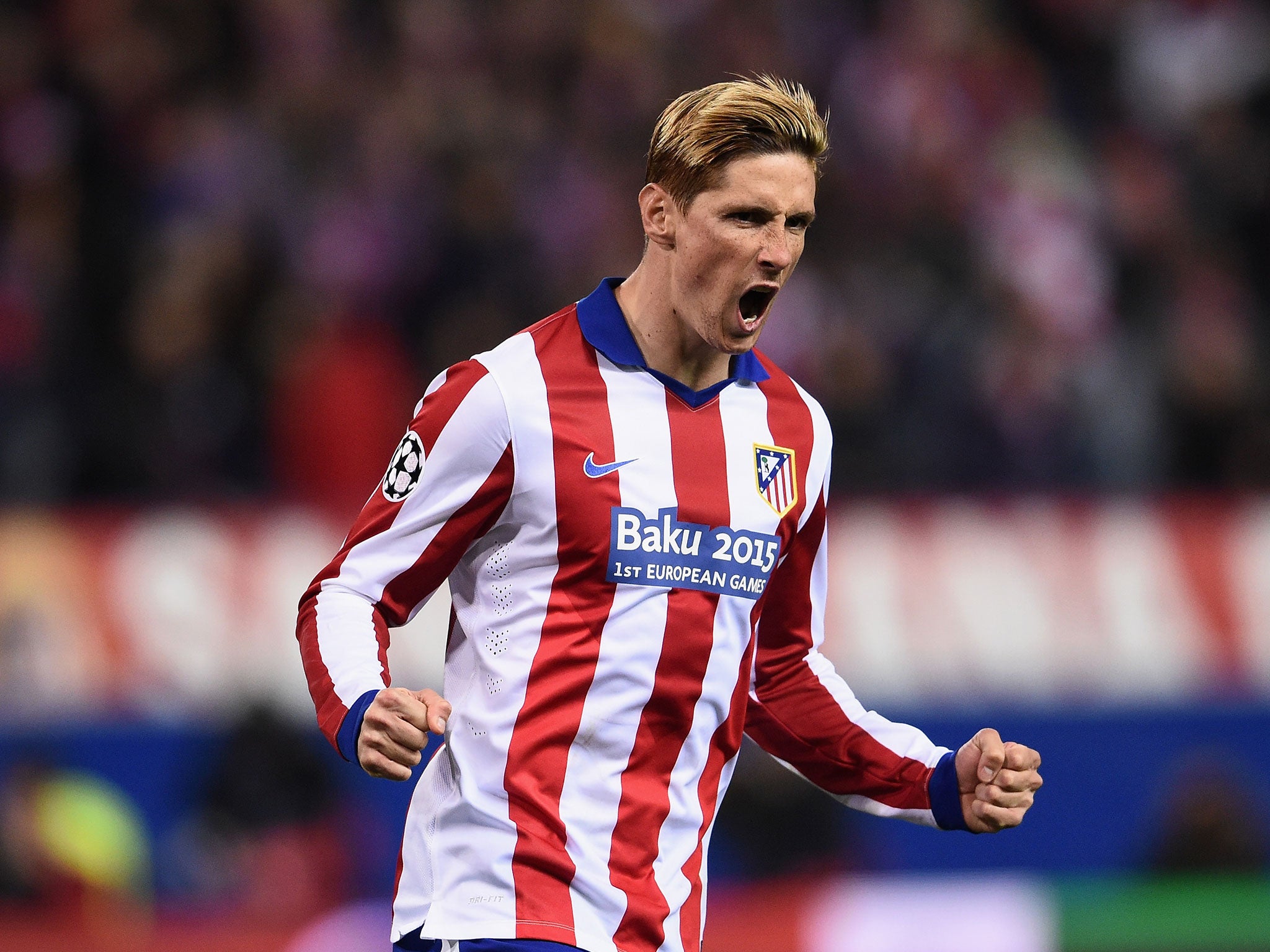 Fernando Torres celebrates his penalty in the spot kick