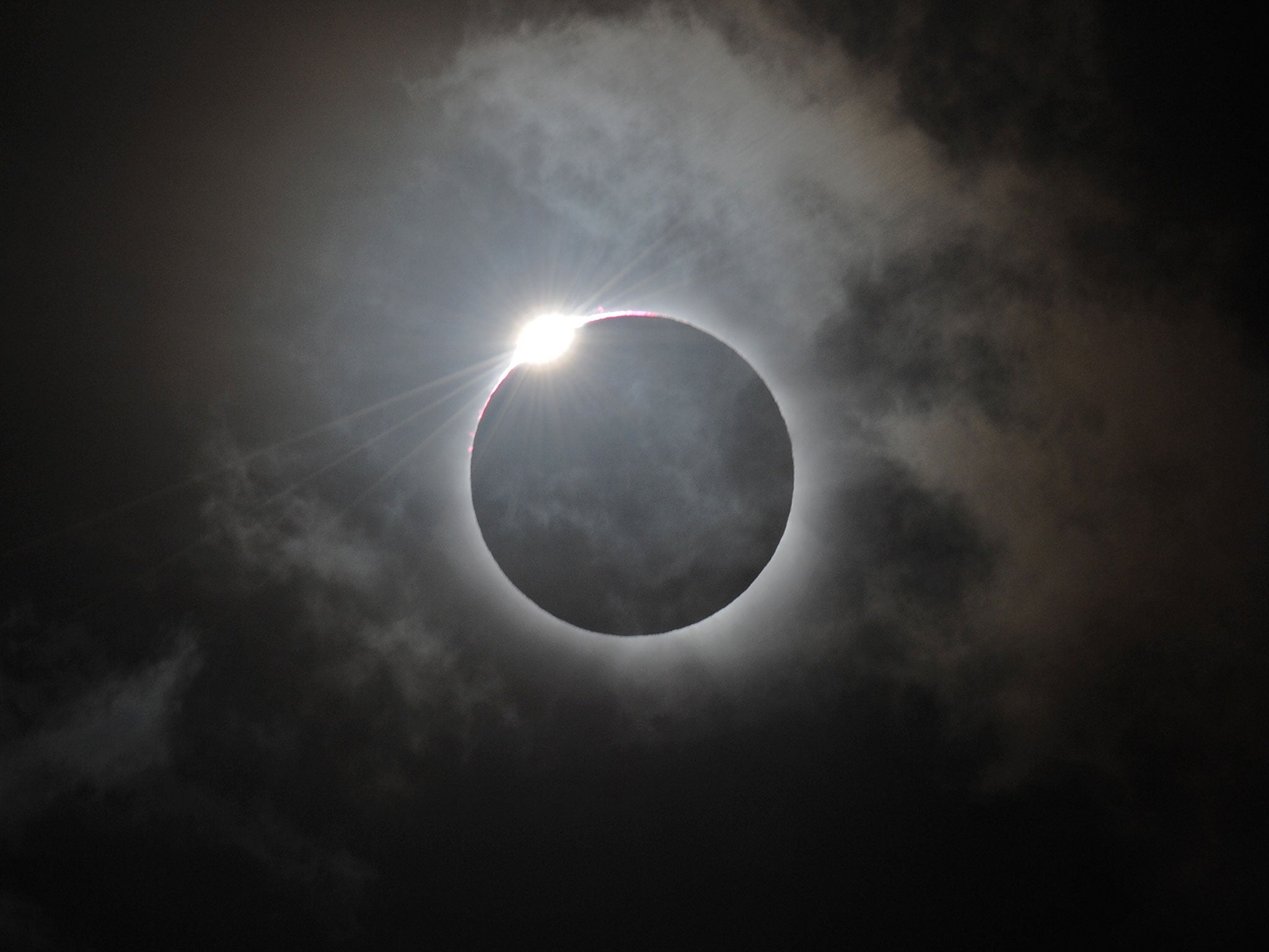 The Diamond Ring effect is shown following totality of the solar eclipse at Palm Cove in Australia's Tropical North Queensland