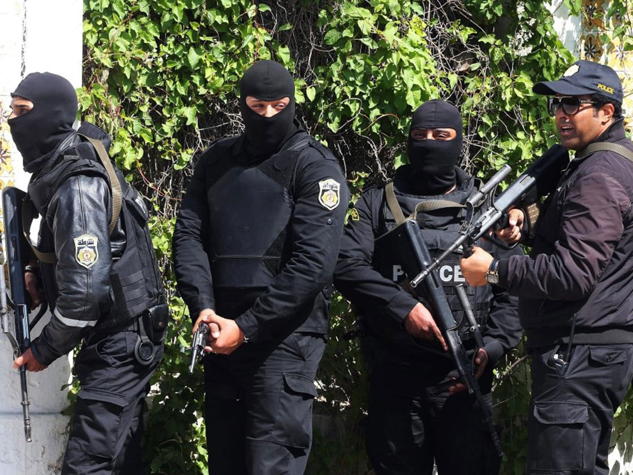 Members of the Tunisian security services take up positions after gunmen reportedly took hostages near the country's parliament, outside the National Bardo Museum, Tunis, Tunisia, 18 March 2015. According to local reports eight people were killed, mostly
