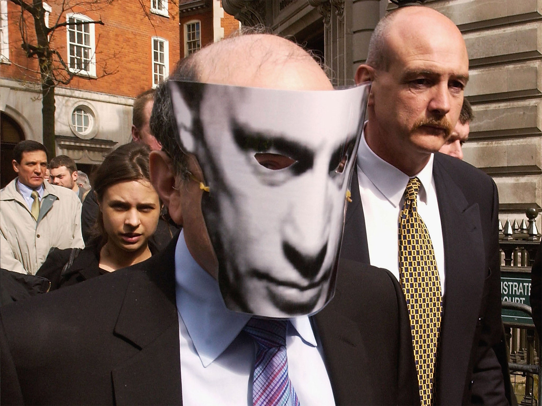 Berezovsky wearing a Putin mask when he fought extradition (Getty)