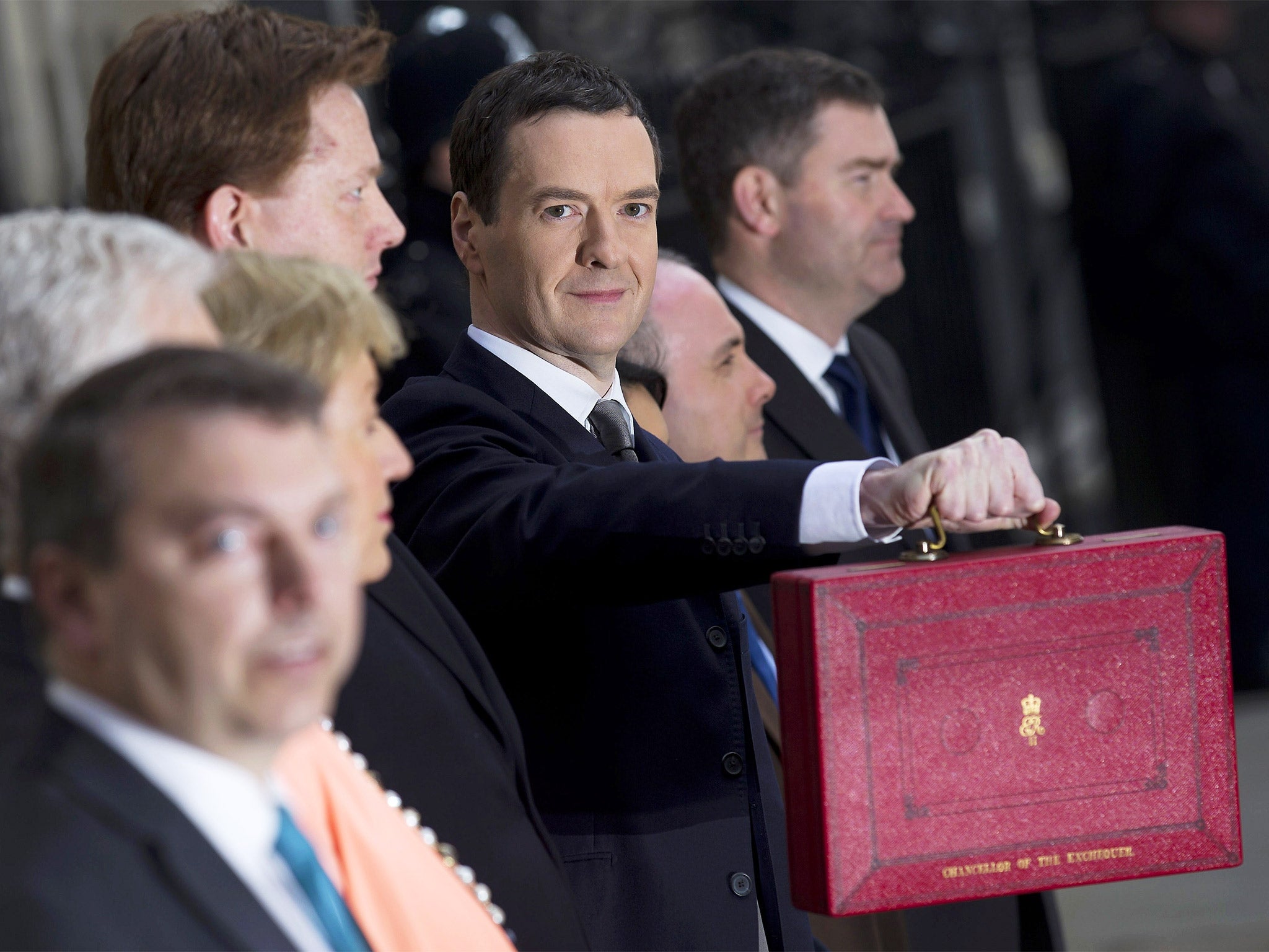 Chancellor George Osborne holds the Budget Box outside 11 Downing Street before unveiling the annual budget