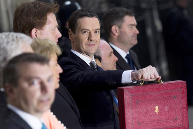 Chancellor George Osborne holds the Budget Box outside 11 Downing Street before unveiling the annual budget