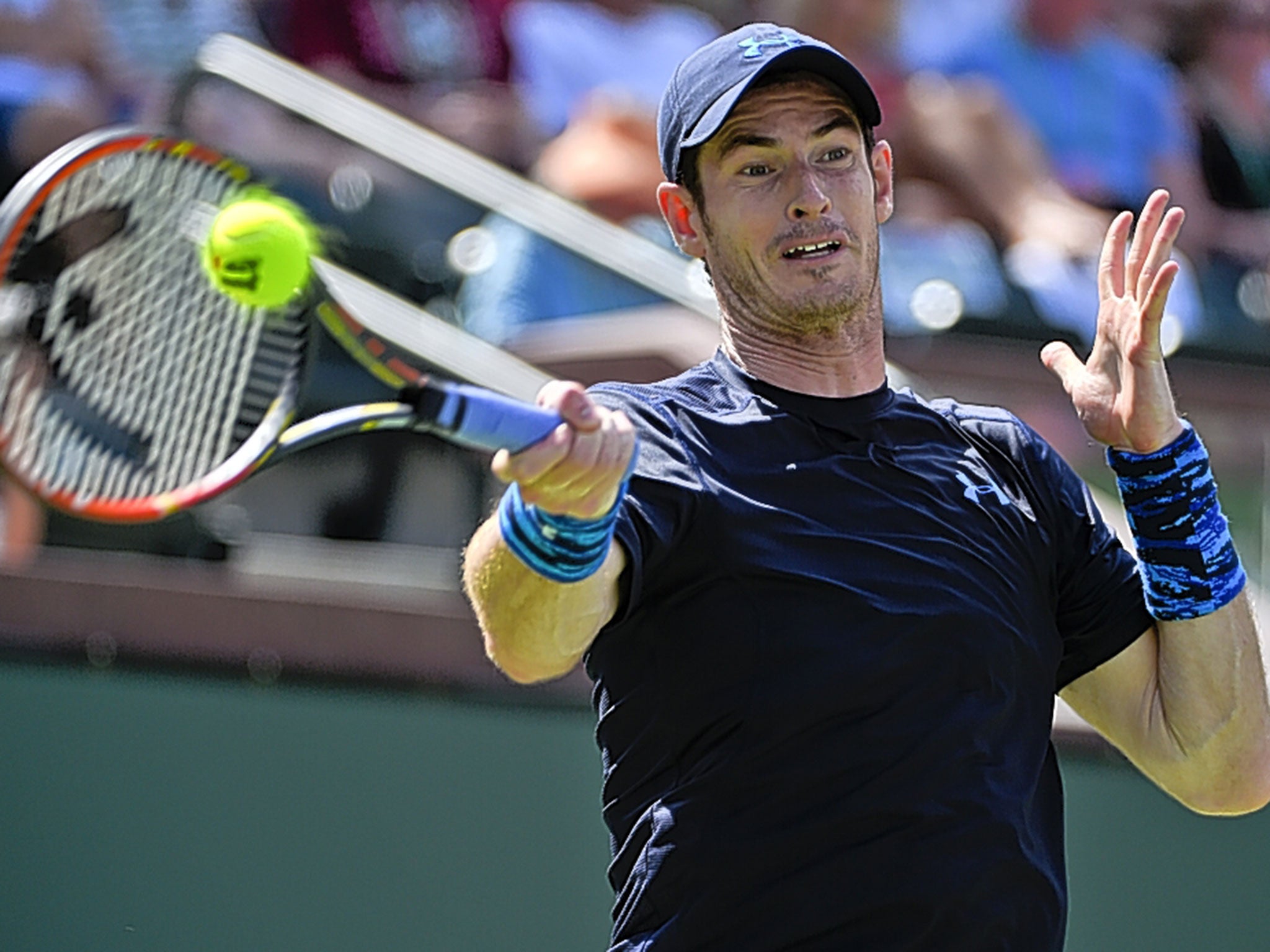 Andy Murray hits a return during his fourth-round victory over Adrian Mannarino